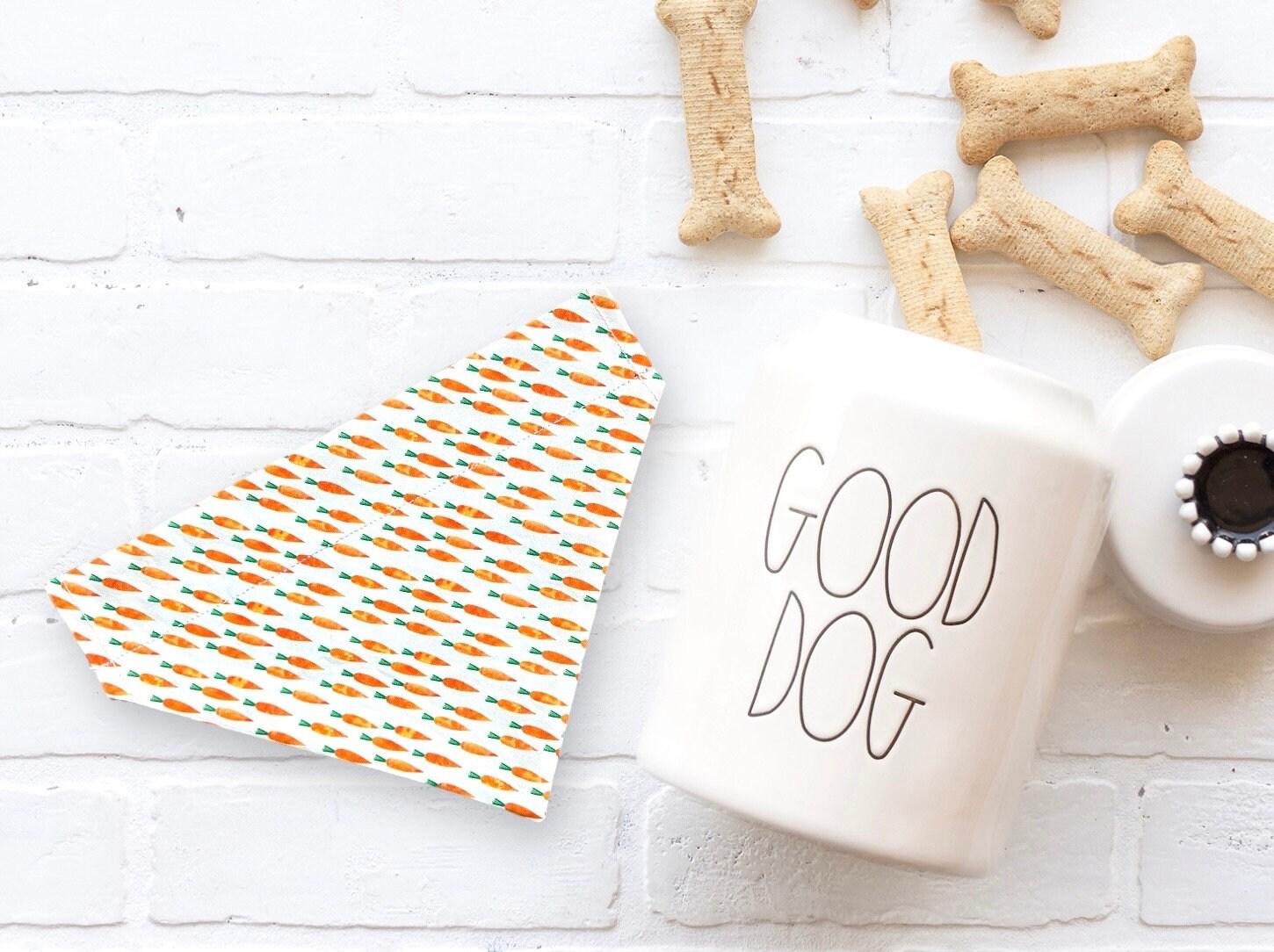 An Easter dog bandana next to some dog bones