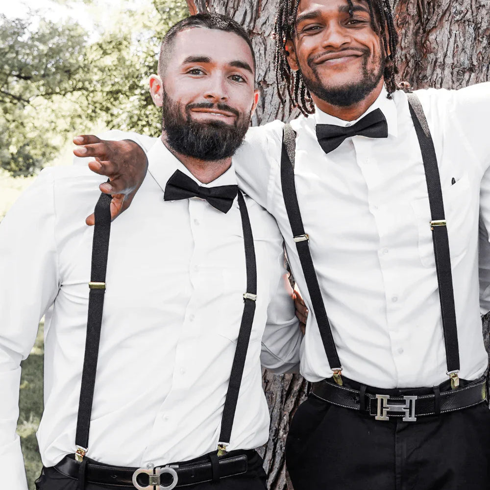 The Bold Bow Tie size chart for bow tie and suspender sets showing Small, Medium, Adult, and Big & Tall sizes with typical age ranges, suspender lengths, and bow tie widths. Small fits ages 6 months–6 years with 18–29 inch suspenders and a 3.5 inch bow tie; Medium fits ages 7–12 years with 25.5–40 inch suspenders and a 4 inch bow tie; Adult fits ages 13 years–6 feet tall with 25.5–40 inch suspenders and a 4.5 inch bow tie; Big & Tall fits over 6 feet tall with 31–53 inch suspenders and a 4.5 inch bow tie.