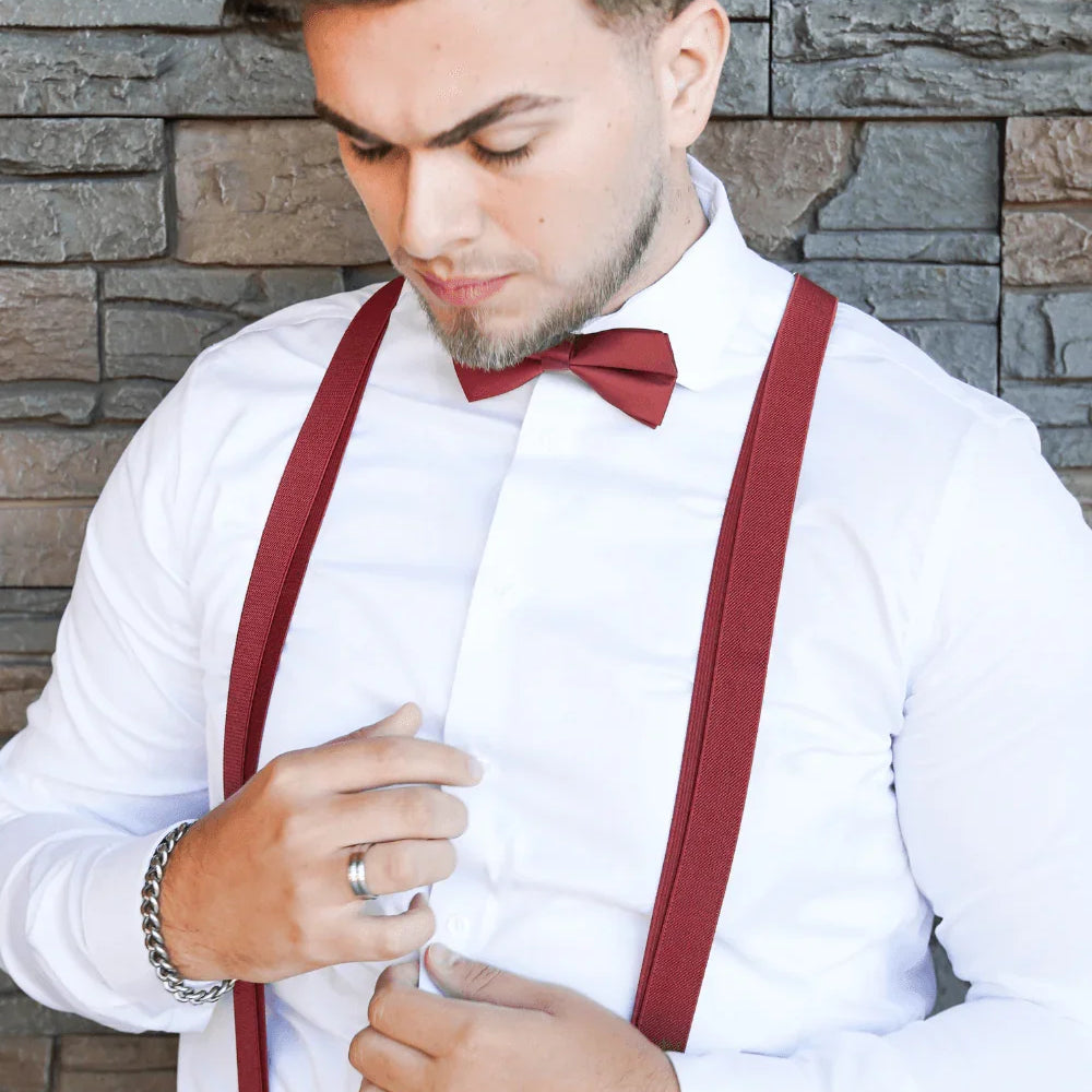 Size chart for suspender and bow tie sets from The Bold Bow Tie. Small (6mo-6yr): 18"-29" suspenders, 3.5" bow. Medium (7-12yr): 25.5"-40" suspenders, 4" bow. Adult (13yr-6ft tall): 25.5"-40" suspenders, 4.5" bow. Big & Tall (Over 6ft tall): 31"-53" suspenders, 4.5" bow. Instructions note to measure from the back waistband over the shoulder to the front waistband for a comfortable fit.