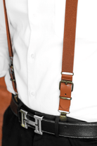 Cognac Vegan Leather Buckle Suspenders for wedding being worn by groomsman