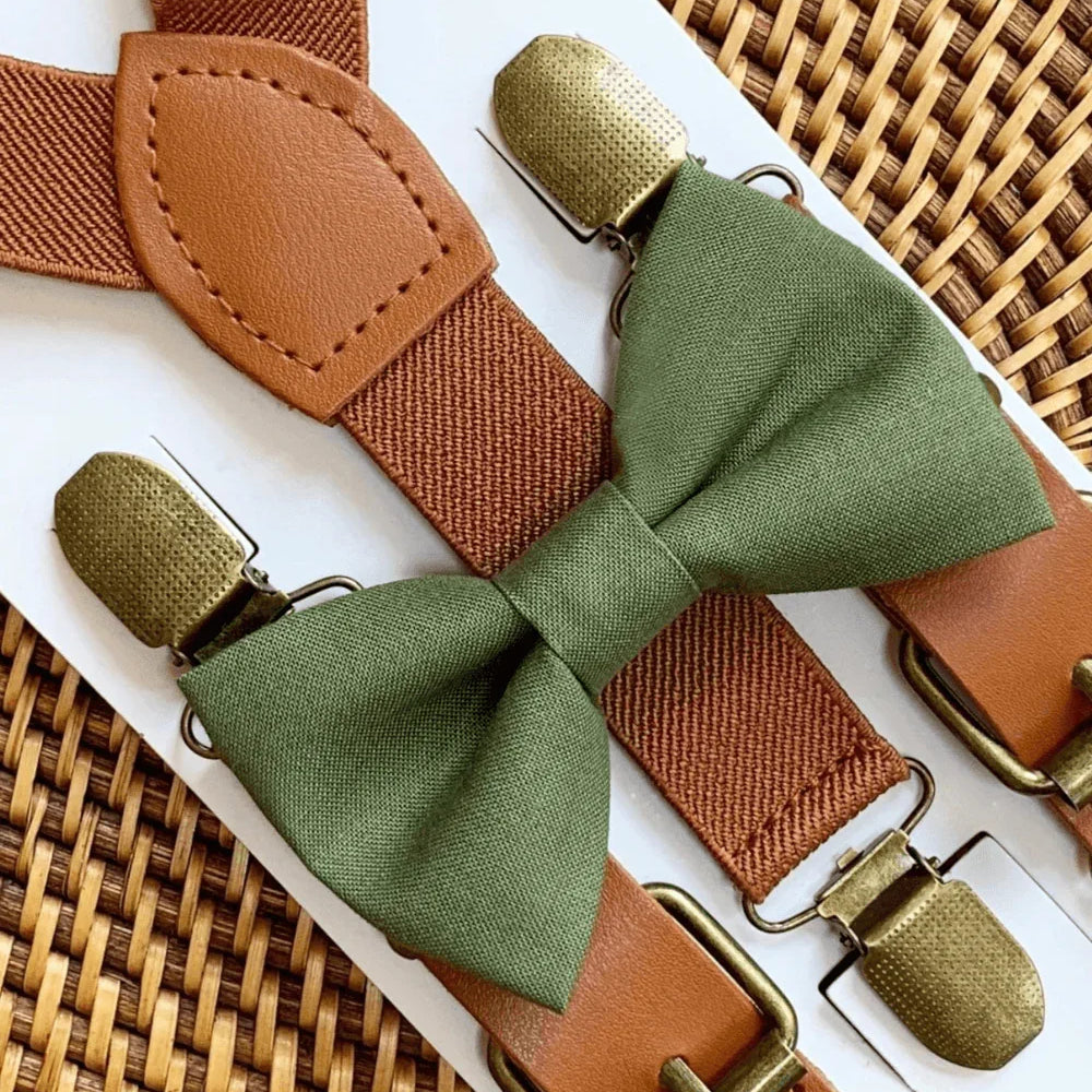 Size chart for suspender and bow tie sets from The Bold Bow Tie. X-Small (6mo-4yr): 15"-23" suspenders, 3.5" bow. Small (5-9yr): 18"-33" suspenders, 3.5" bow. Medium (10-12yr): 18"-33" suspenders, 4" bow. Adult (13yr-6'5"): 30"-53" suspenders, 4.5" bow. Big & Tall (Over 6'5"): 53"+ suspenders, 4.5" bow. Instructions note to measure from the back waistband over the shoulder to the front waistband for a comfortable fit.