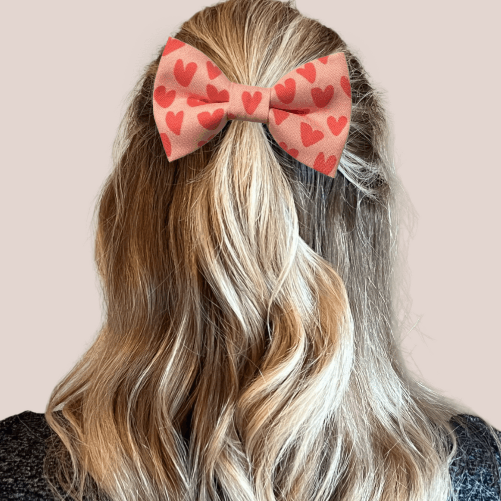 Bows in 3 sizes: Small is 3 1/2 inches wide, Medium is 4 1/2 inches wide and Large is 4 1/2 inches wide.