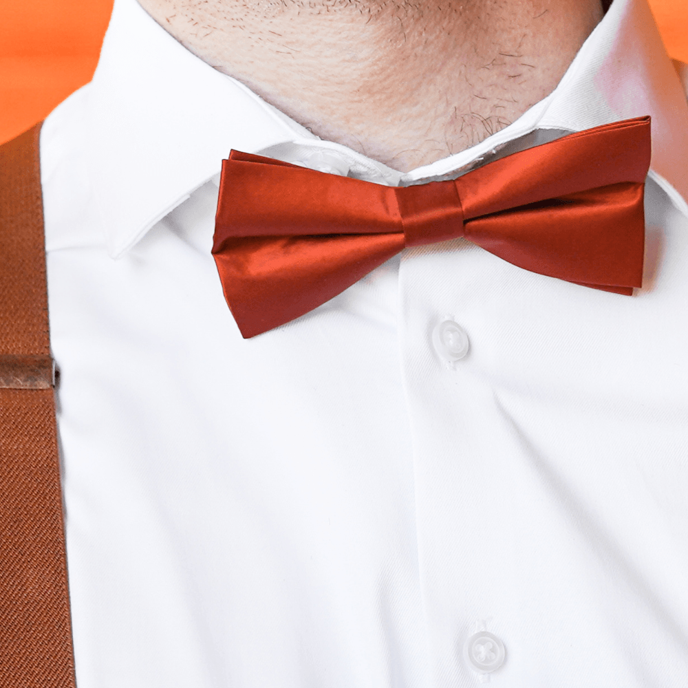 Rust Bow Tie displayed on a groomsmen in a wedding.
