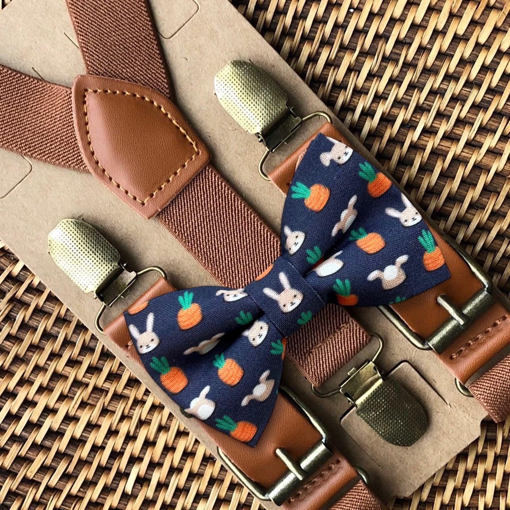 a bow tie and suspenders sitting on a chair