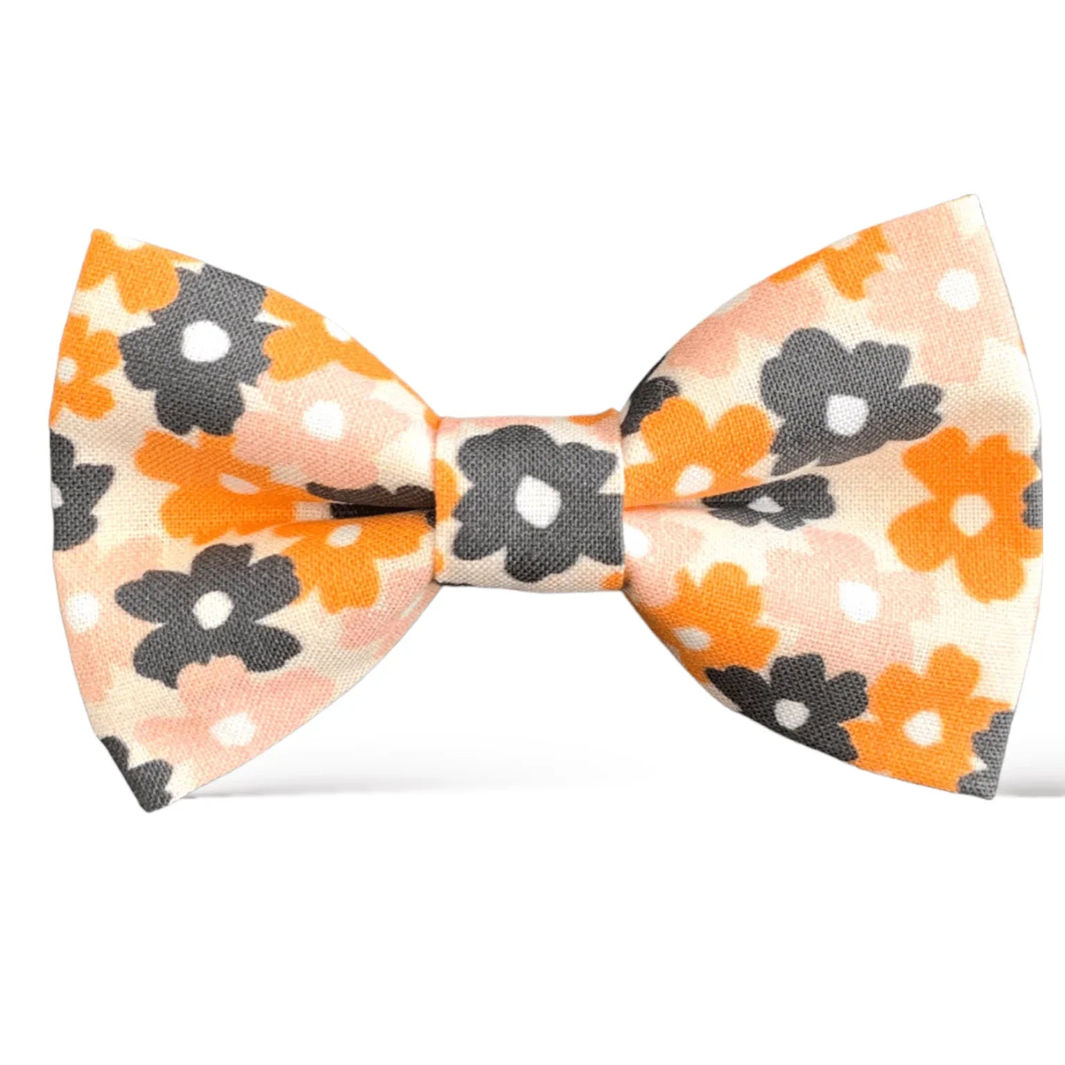 Size chart for pre-tied bow ties from The Bold Bow Tie detailing measurements across three sizes. Small is 3.5 inches wide and recommended for ages 6 months to 5 years. Medium is 4 inches wide and recommended for ages 6 to 12 years. Large is 4.5 inches wide and recommended for ages 13 years and up. Visual icons illustrate the relative sizes with horizontal arrows showing that width is measured from wingtip to wingtip. Bottom text notes that all bow ties are pre-tied and ready to add to your outfit.