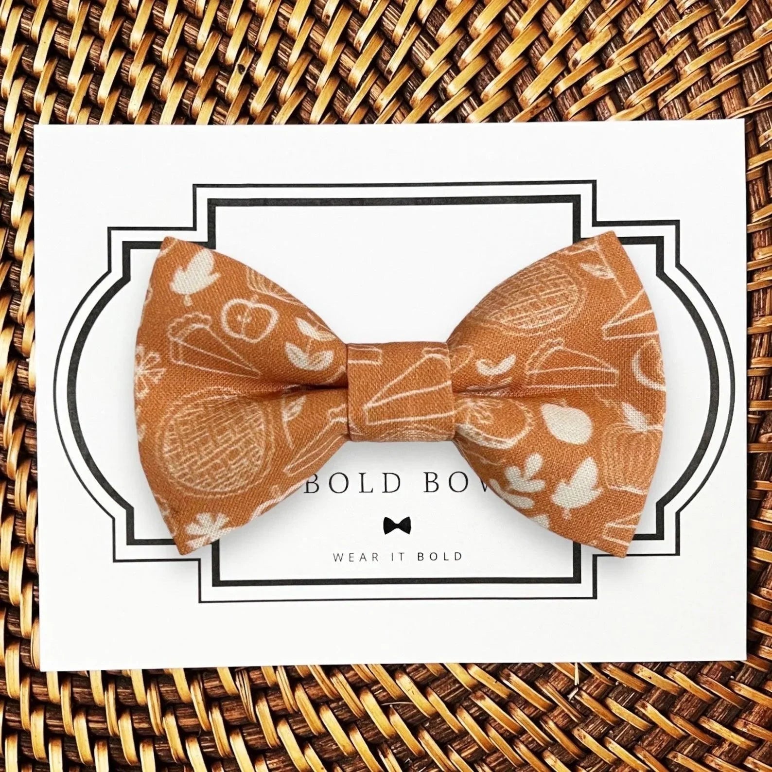 Dog bow tie size chart. Size Small is 3 1/2 inches wide for small dogs under 15 lbs. Size Medium is 4 inches wide for medium dogs between 15 band 40 lbs. Size Large is 4 1/2 inches wide for Large Dogs between 40 band 80 lbs. Size Extra Large is 5 1/2 inches wide for Extra Large Dogs over 80 lbs. Sizing is up to preference and pet bow ties slide on to dog collars with elastic.
