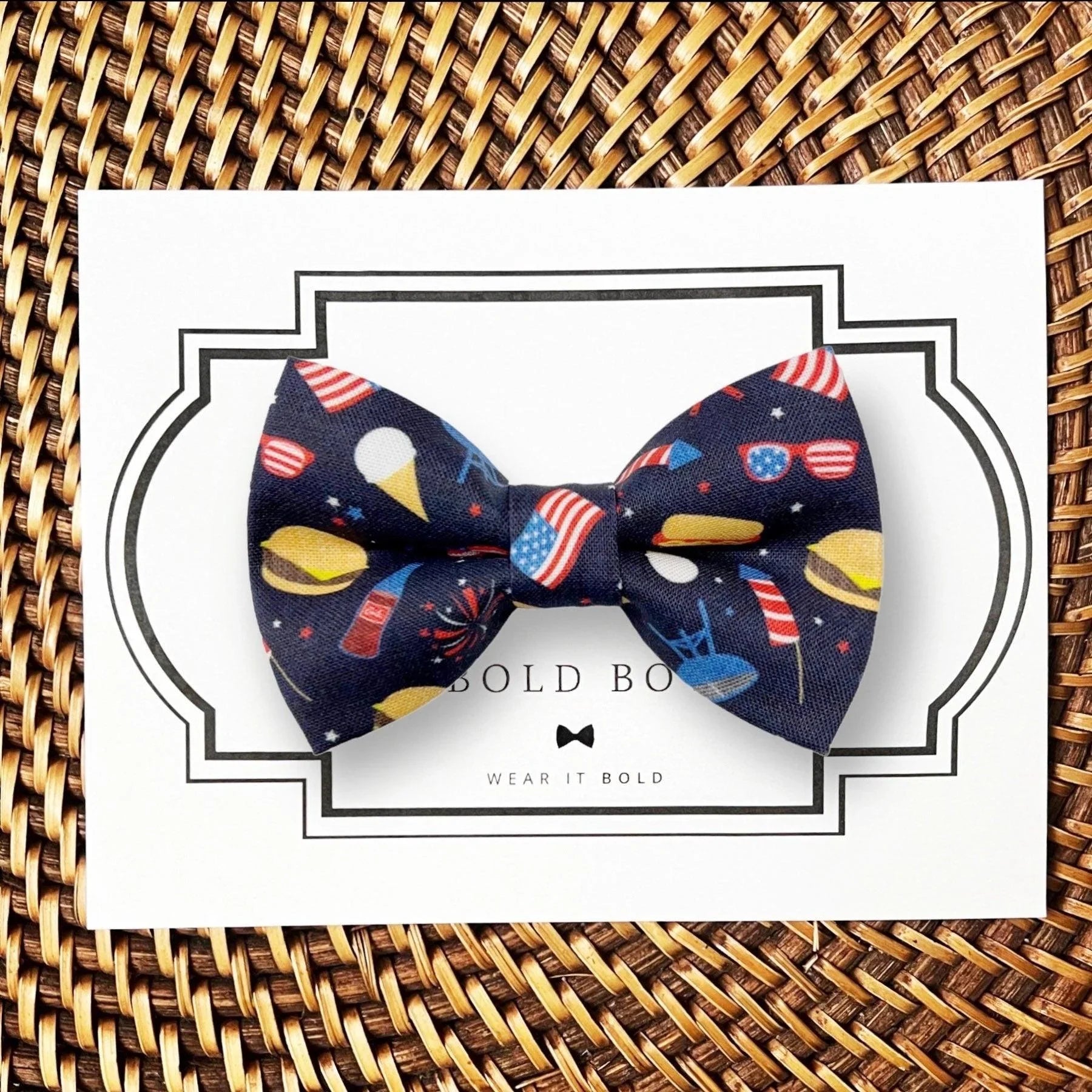 Dog bow tie size chart. Size Small is 3 1/2 inches wide for small dogs under 15 lbs. Size Medium is 4 inches wide for medium dogs between 15 band 40 lbs. Size Large is 4 1/2 inches wide for Large Dogs between 40 band 80 lbs. Size Extra Large is 5 1/2 inches wide for Extra Large Dogs over 80 lbs. Sizing is up to preference and pet bow ties slide on to dog collars with elastic.