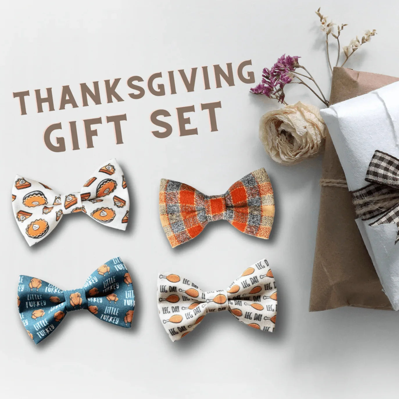 Thanksgiving themed pet bow tie gift set with four printed bow ties on a light background