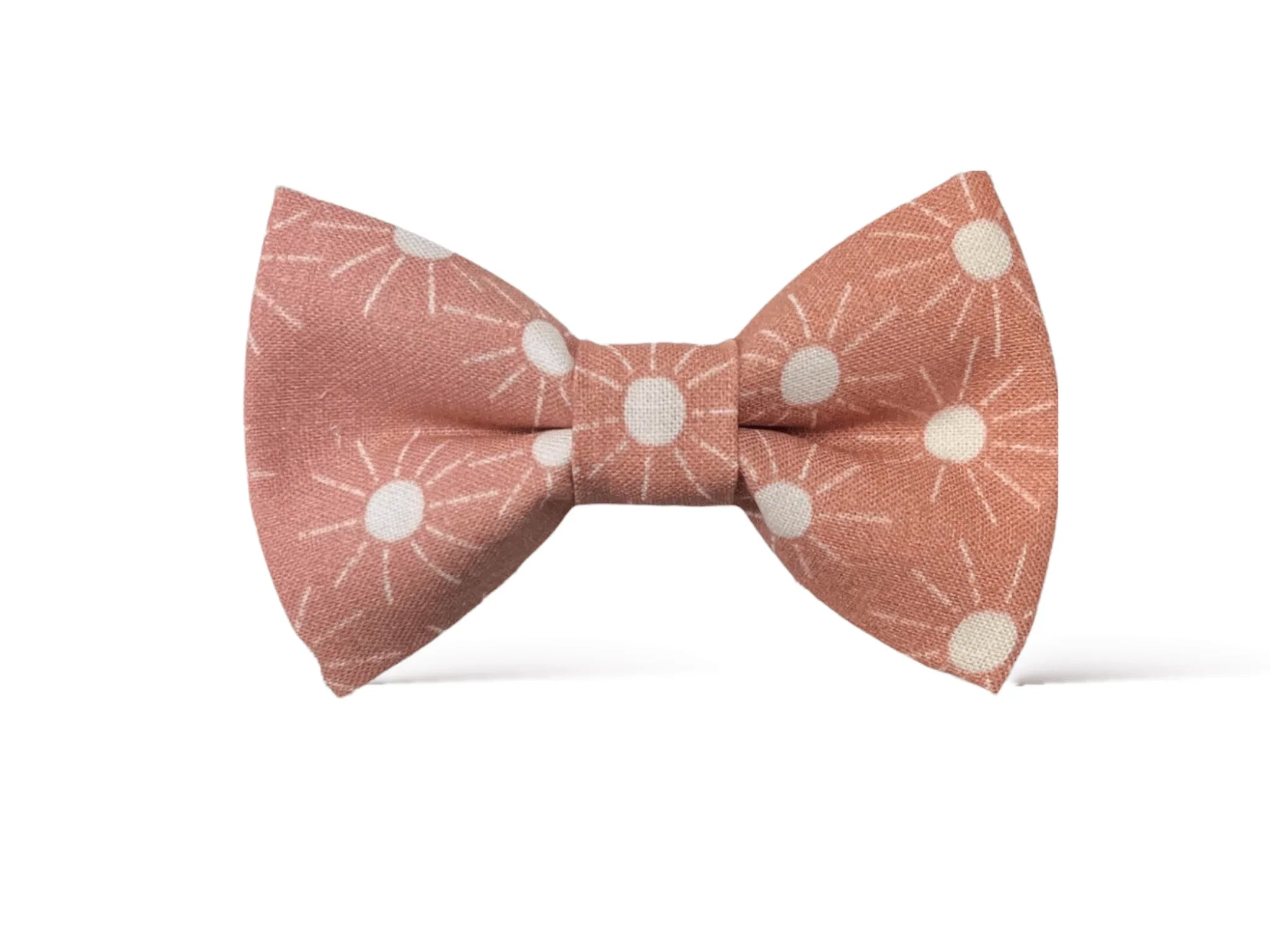 A pre-tied pink bow tie with a boho pattern, displayed on a white background