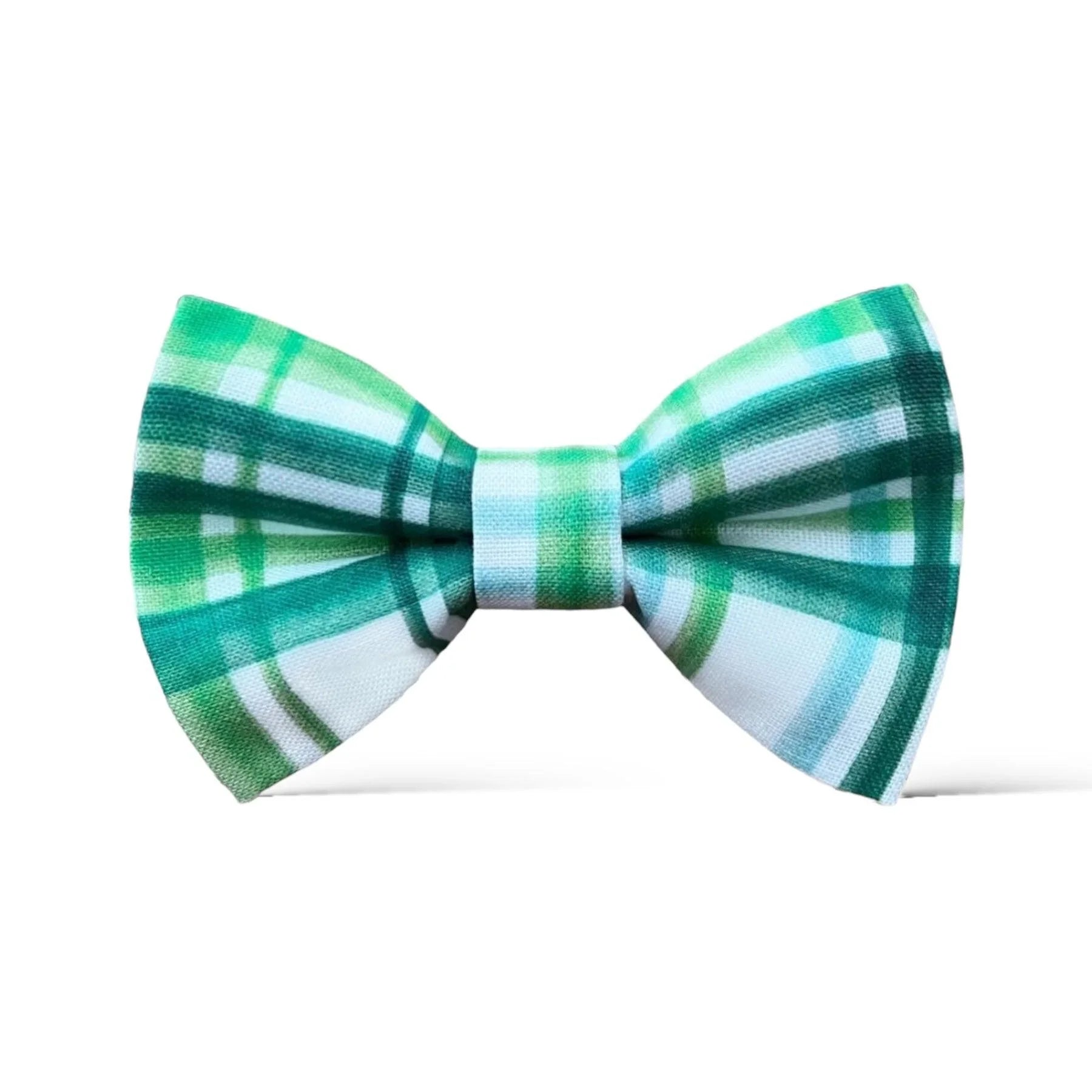 Size chart for pre-tied bow ties from The Bold Bow Tie detailing measurements across three sizes. Small is 3.5 inches wide and recommended for ages 6 months to 5 years. Medium is 4 inches wide and recommended for ages 6 to 12 years. Large is 4.5 inches wide and recommended for ages 13 years and up. Visual icons illustrate the relative sizes with horizontal arrows showing that width is measured from wingtip to wingtip. Bottom text notes that all bow ties are pre-tied and ready to add to your outfit.