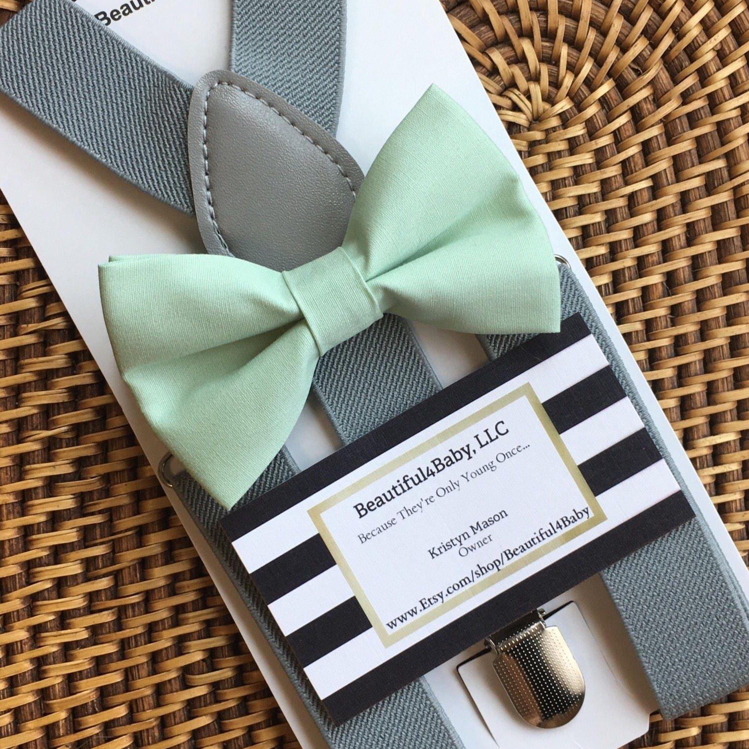 Size chart for suspender and bow tie sets from The Bold Bow Tie. Small (6mo-6yr): 18"-29" suspenders, 3.5" bow. Medium (7-12yr): 25.5"-40" suspenders, 4" bow. Adult (13yr-6ft tall): 25.5"-40" suspenders, 4.5" bow. Big & Tall (Over 6ft tall): 31"-53" suspenders, 4.5" bow. Instructions note to measure from the back waistband over the shoulder to the front waistband for a comfortable fit.