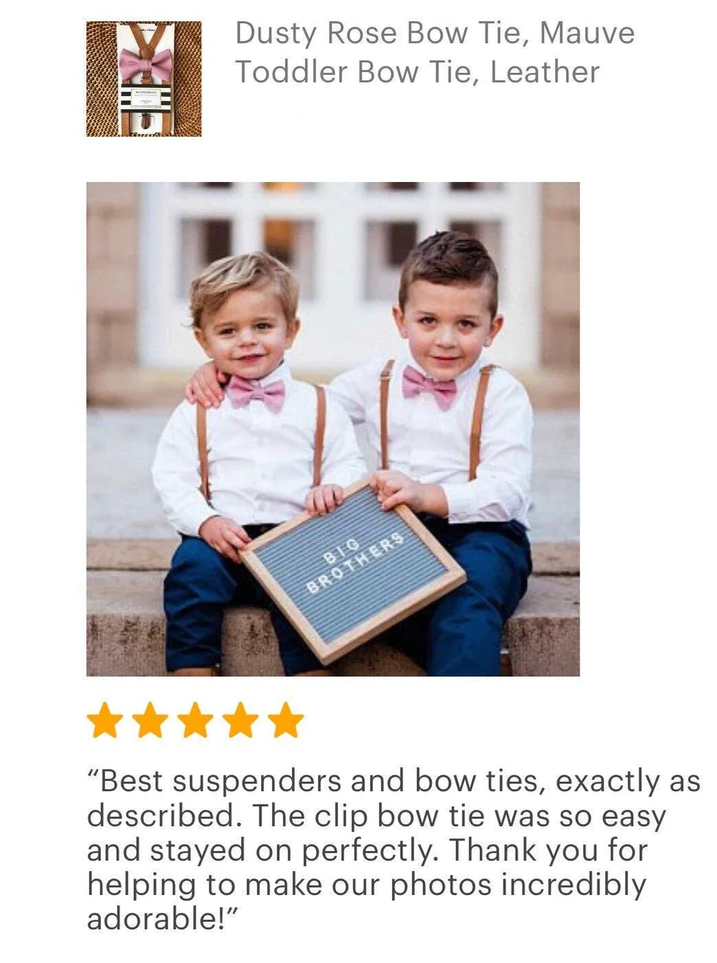 Two elementary school boys in dusty rose bow ties for boys and brown suspenders for a wedding with a "Big Brothers" sign.