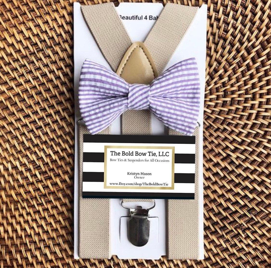 The Bold Bow Tie size chart for bow tie and suspender sets showing Small, Medium, Adult, and Big & Tall sizes with typical age ranges, suspender lengths, and bow tie widths. Small fits ages 6 months–6 years with 18–29 inch suspenders and a 3.5 inch bow tie; Medium fits ages 7–12 years with 25.5–40 inch suspenders and a 4 inch bow tie; Adult fits ages 13 years–6 feet tall with 25.5–40 inch suspenders and a 4.5 inch bow tie; Big & Tall fits over 6 feet tall with 31–53 inch suspenders and a 4.5 inch bow tie.