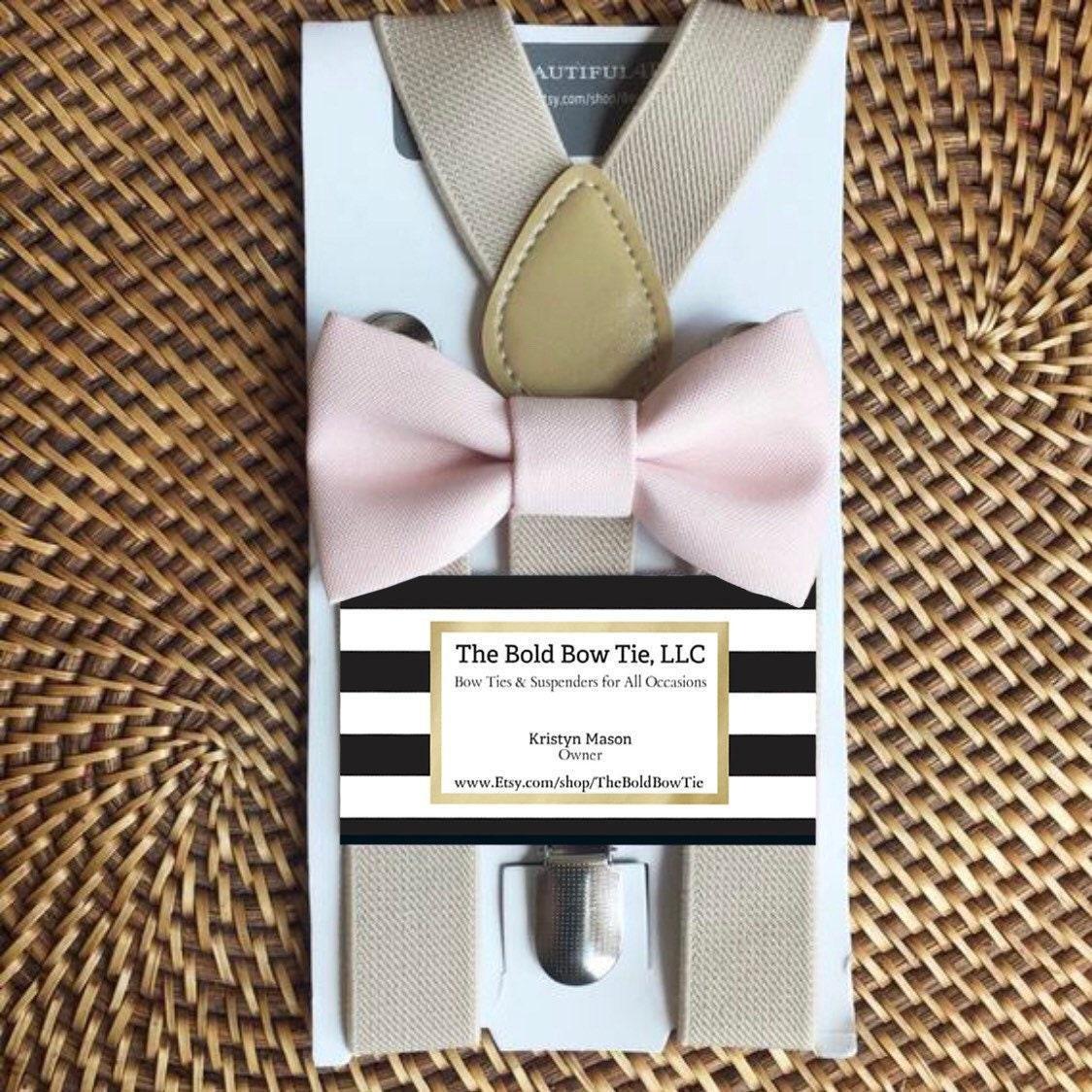 Size chart for suspender and bow tie sets from The Bold Bow Tie. Small (6mo-6yr): 18"-29" suspenders, 3.5" bow. Medium (7-12yr): 25.5"-40" suspenders, 4" bow. Adult (13yr-6ft tall): 25.5"-40" suspenders, 4.5" bow. Big & Tall (Over 6ft tall): 31"-53" suspenders, 4.5" bow. Instructions note to measure from the back waistband over the shoulder to the front waistband for a comfortable fit.