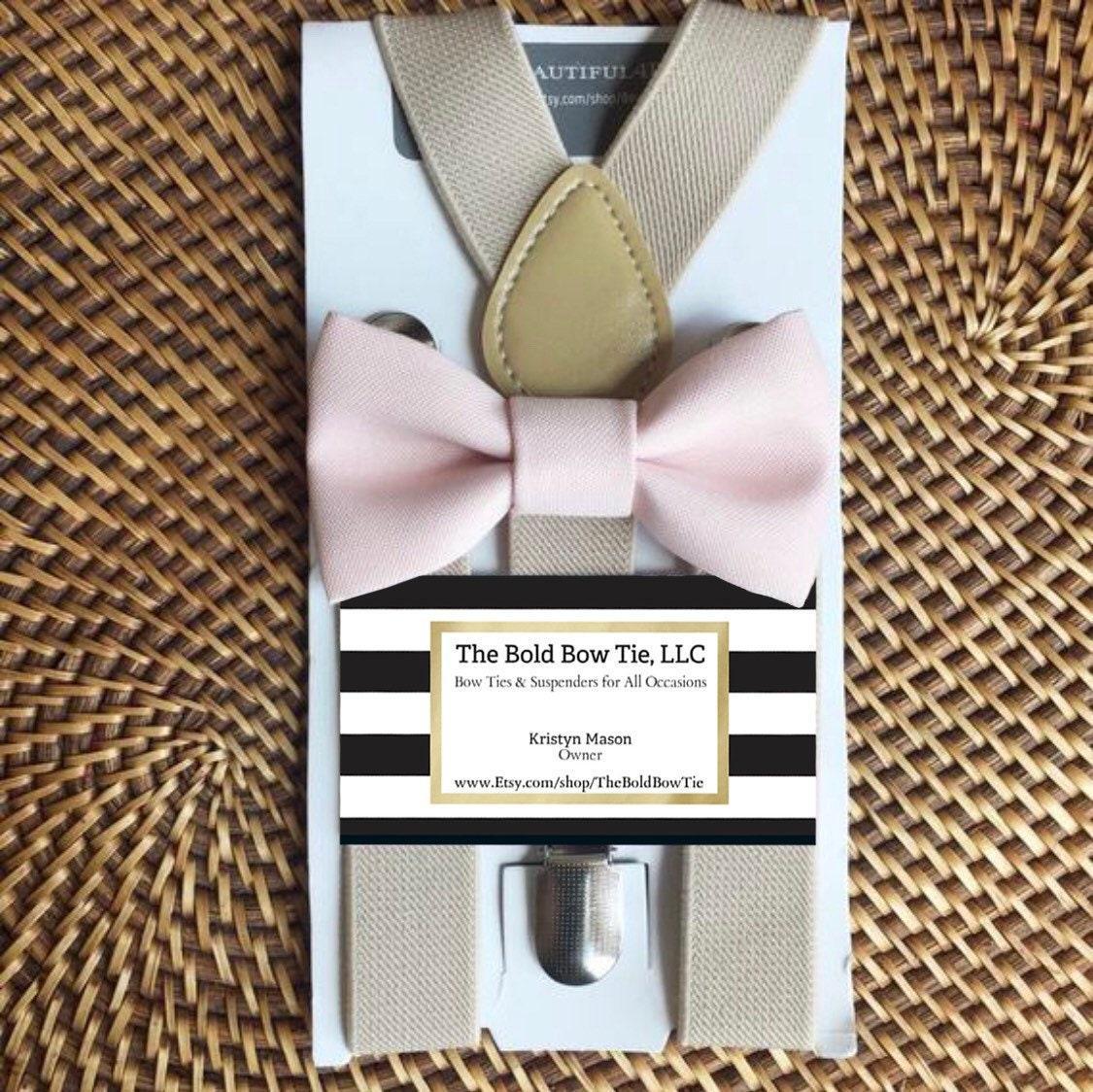 Size chart for suspender and bow tie sets from The Bold Bow Tie. Small (6mo-6yr): 18"-29" suspenders, 3.5" bow. Medium (7-12yr): 25.5"-40" suspenders, 4" bow. Adult (13yr-6ft tall): 25.5"-40" suspenders, 4.5" bow. Big & Tall (Over 6ft tall): 31"-53" suspenders, 4.5" bow. Instructions note to measure from the back waistband over the shoulder to the front waistband for a comfortable fit.