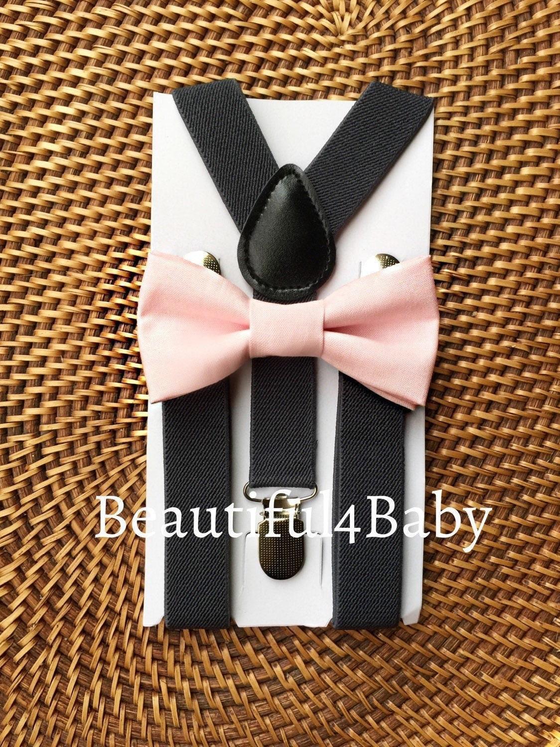 Blush pink bow tie and suspenders for wedding.