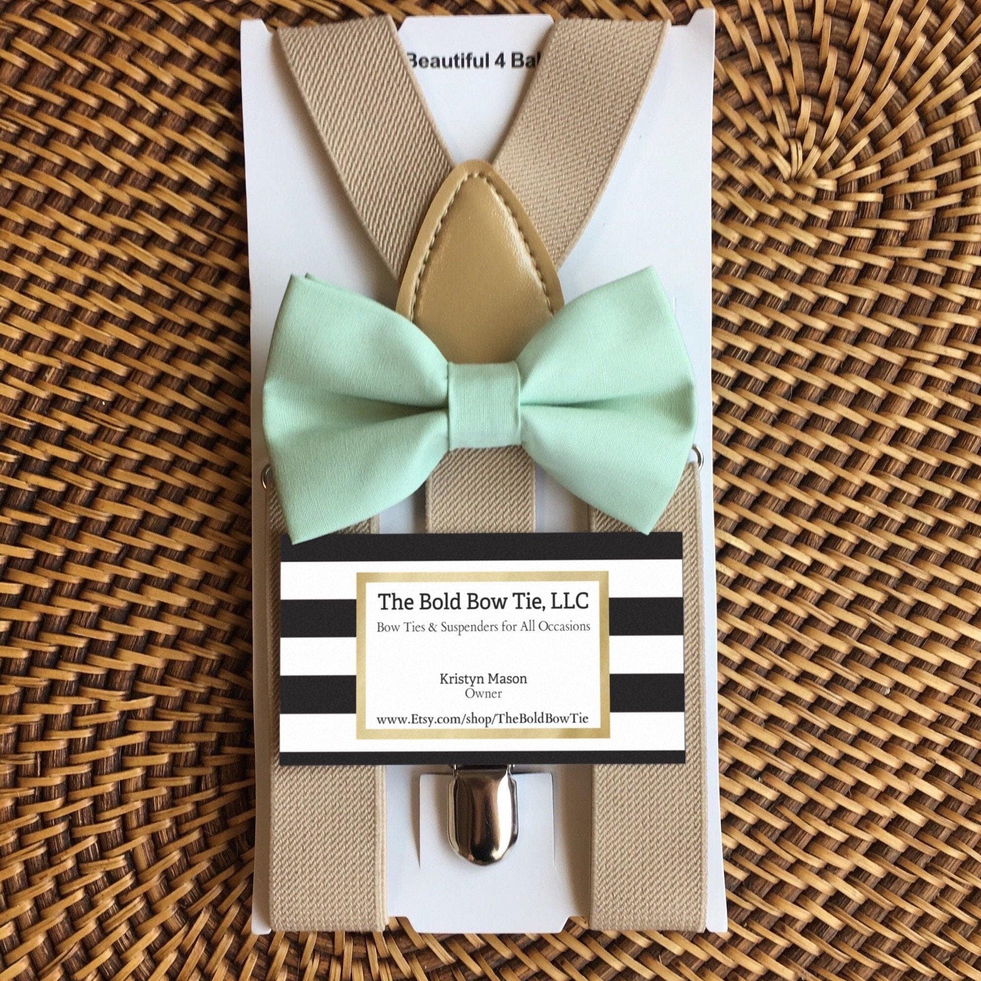 Size chart for suspender and bow tie sets from The Bold Bow Tie. Small (6mo-6yr): 18"-29" suspenders, 3.5" bow. Medium (7-12yr): 25.5"-40" suspenders, 4" bow. Adult (13yr-6ft tall): 25.5"-40" suspenders, 4.5" bow. Big & Tall (Over 6ft tall): 31"-53" suspenders, 4.5" bow. Instructions note to measure from the back waistband over the shoulder to the front waistband for a comfortable fit.
