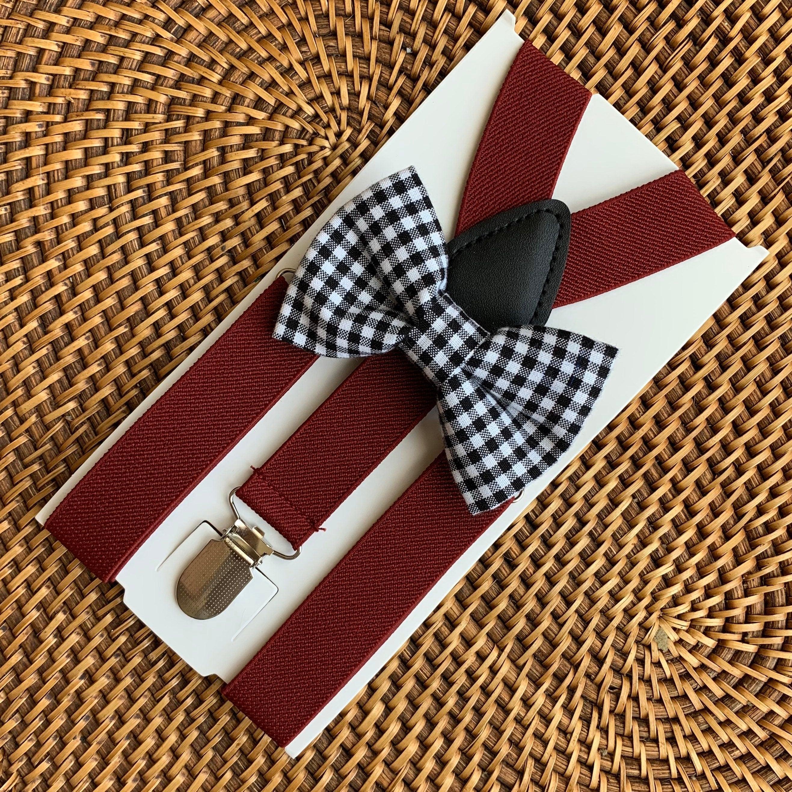 Size chart for suspender and bow tie sets from The Bold Bow Tie. Small (6mo-6yr): 18"-29" suspenders, 3.5" bow. Medium (7-12yr): 25.5"-40" suspenders, 4" bow. Adult (13yr-6ft tall): 25.5"-40" suspenders, 4.5" bow. Big & Tall (Over 6ft tall): 31"-53" suspenders, 4.5" bow. Instructions note to measure from the back waistband over the shoulder to the front waistband for a comfortable fit.
