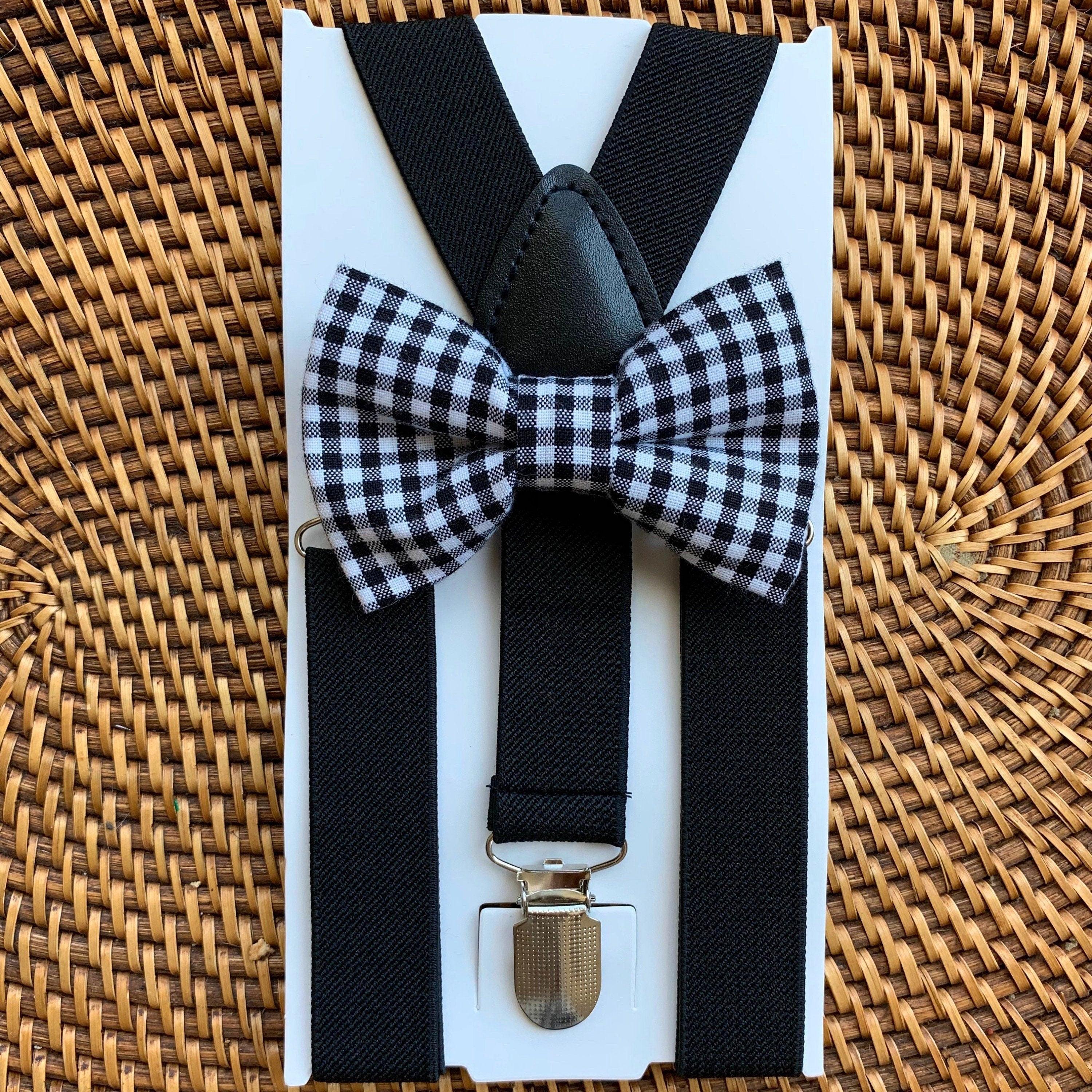 Size chart for suspender and bow tie sets from The Bold Bow Tie. Small (6mo-6yr): 18"-29" suspenders, 3.5" bow. Medium (7-12yr): 25.5"-40" suspenders, 4" bow. Adult (13yr-6ft tall): 25.5"-40" suspenders, 4.5" bow. Big & Tall (Over 6ft tall): 31"-53" suspenders, 4.5" bow. Instructions note to measure from the back waistband over the shoulder to the front waistband for a comfortable fit.