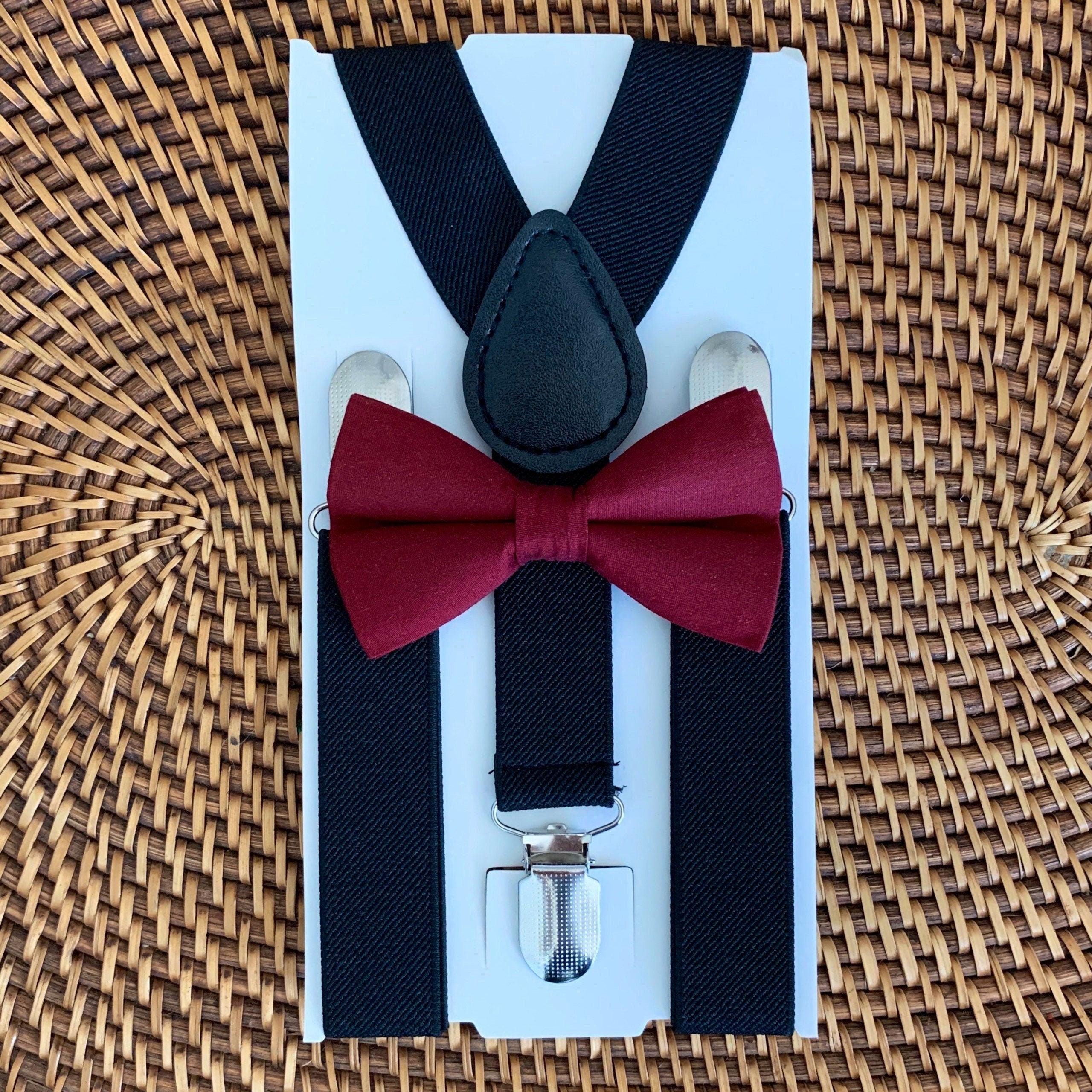 The Bold Bow Tie size chart for bow tie and suspender sets showing Small, Medium, Adult, and Big & Tall sizes with typical age ranges, suspender lengths, and bow tie widths. Small fits ages 6 months–6 years with 18–29 inch suspenders and a 3.5 inch bow tie; Medium fits ages 7–12 years with 25.5–40 inch suspenders and a 4 inch bow tie; Adult fits ages 13 years–6 feet tall with 25.5–40 inch suspenders and a 4.5 inch bow tie; Big & Tall fits over 6 feet tall with 31–53 inch suspenders and a 4.5 inch bow tie.