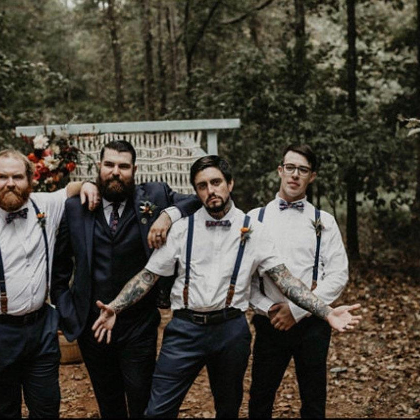 Groomsmen in bow ties and suspenders