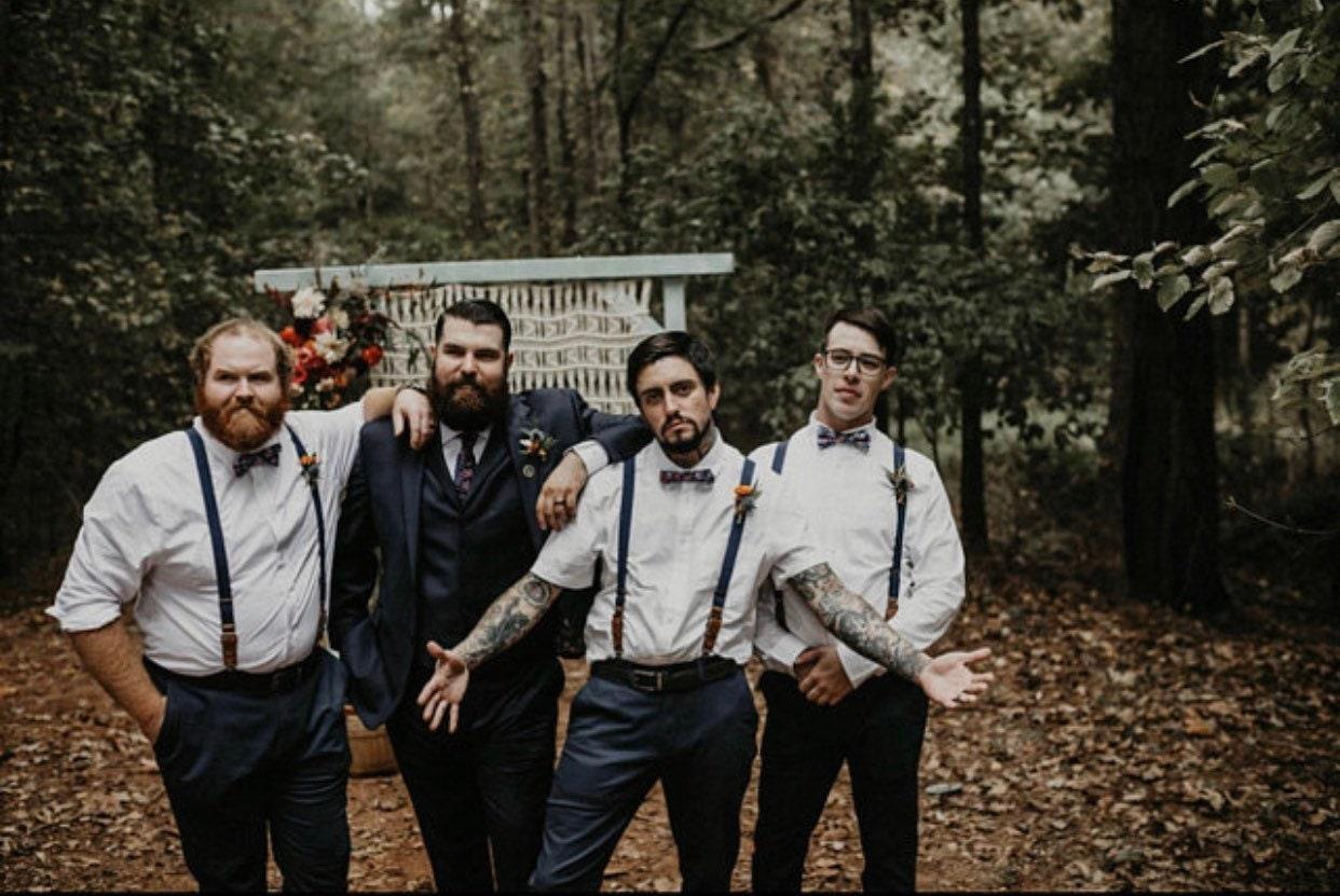 Groomsmen in bow ties and suspenders