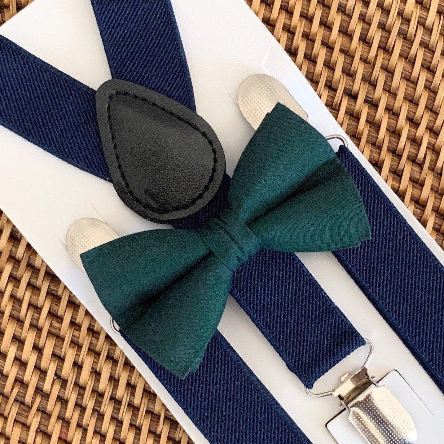 The Bold Bow Tie size chart for bow tie and suspender sets showing Small, Medium, Adult, and Big & Tall sizes with typical age ranges, suspender lengths, and bow tie widths. Small fits ages 6 months–6 years with 18–29 inch suspenders and a 3.5 inch bow tie; Medium fits ages 7–12 years with 25.5–40 inch suspenders and a 4 inch bow tie; Adult fits ages 13 years–6 feet tall with 25.5–40 inch suspenders and a 4.5 inch bow tie; Big & Tall fits over 6 feet tall with 31–53 inch suspenders and a 4.5 inch bow tie.