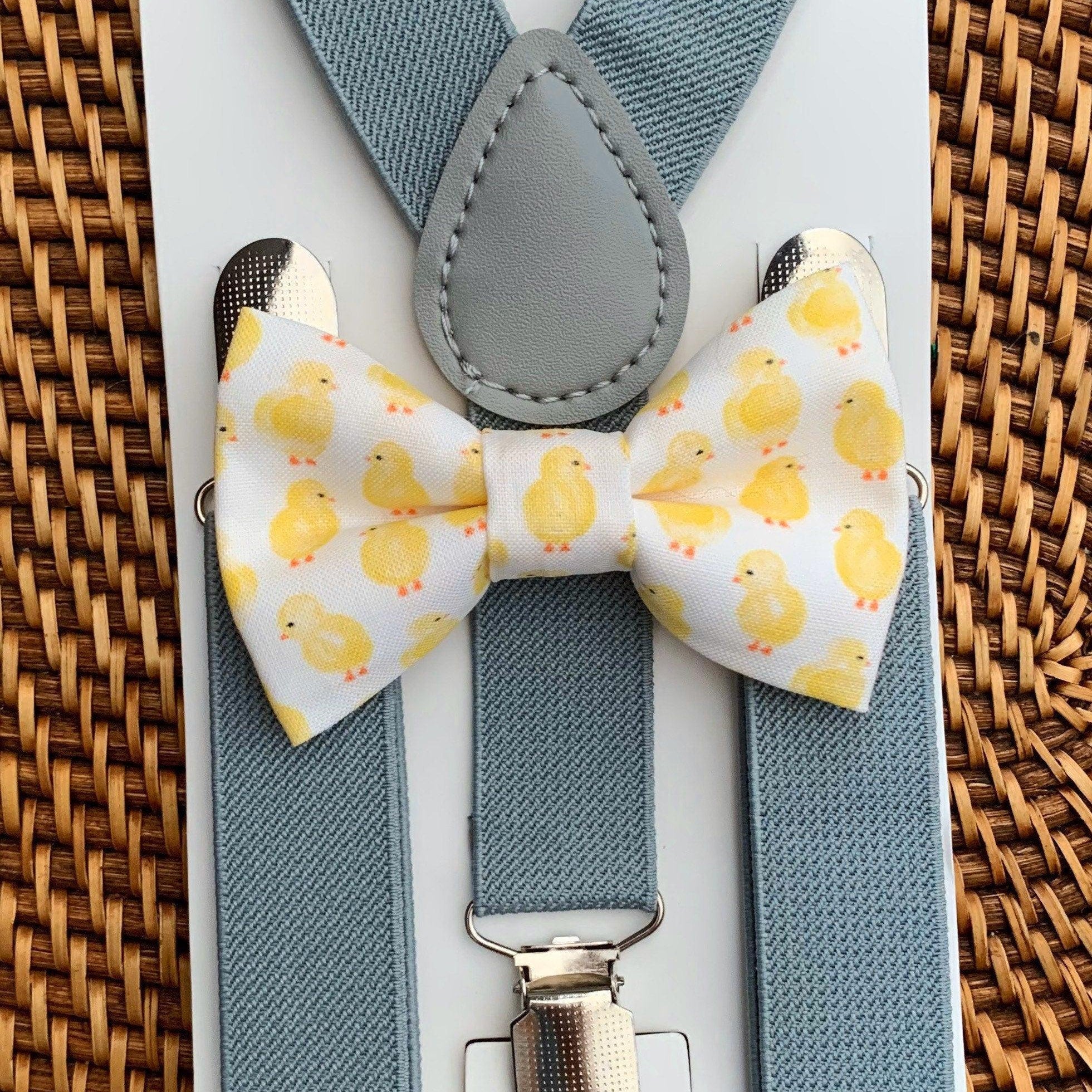 The Bold Bow Tie size chart for bow tie and suspender sets showing Small, Medium, Adult, and Big & Tall sizes with typical age ranges, suspender lengths, and bow tie widths. Small fits ages 6 months–6 years with 18–29 inch suspenders and a 3.5 inch bow tie; Medium fits ages 7–12 years with 25.5–40 inch suspenders and a 4 inch bow tie; Adult fits ages 13 years–6 feet tall with 25.5–40 inch suspenders and a 4.5 inch bow tie; Big & Tall fits over 6 feet tall with 31–53 inch suspenders and a 4.5 inch bow tie.