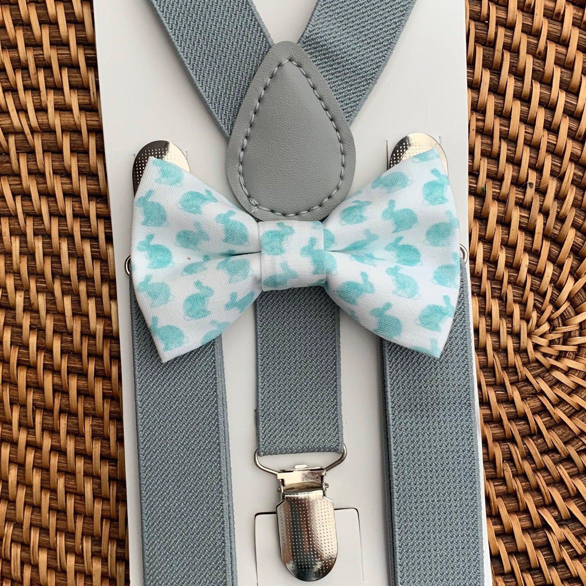 Blue watercolor Easter bunny bow tie with light grey suspenders on a white card