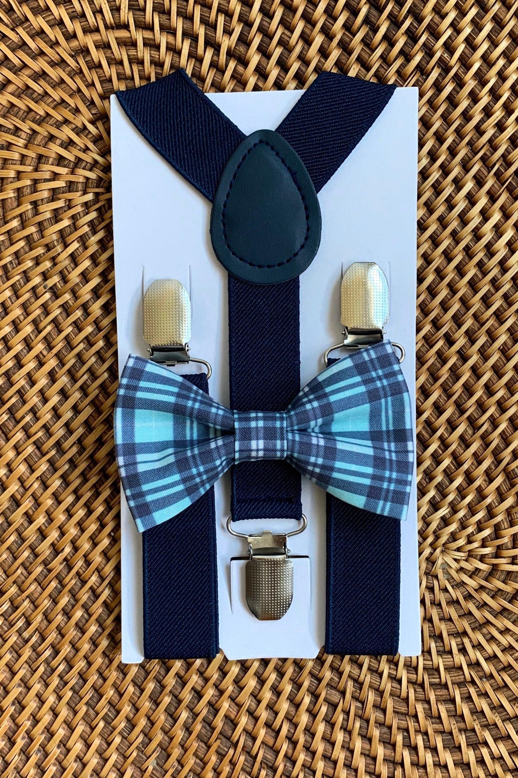 Size chart for suspender and bow tie sets from The Bold Bow Tie. Small (6mo-6yr): 18"-29" suspenders, 3.5" bow. Medium (7-12yr): 25.5"-40" suspenders, 4" bow. Adult (13yr-6ft tall): 25.5"-40" suspenders, 4.5" bow. Big & Tall (Over 6ft tall): 31"-53" suspenders, 4.5" bow. Instructions note to measure from the back waistband over the shoulder to the front waistband for a comfortable fit.