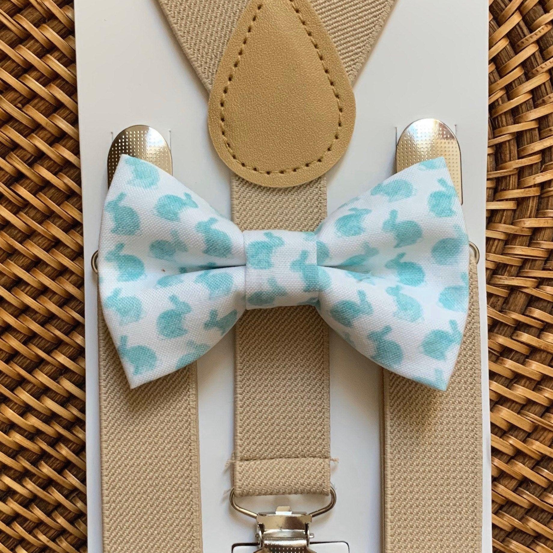 The Bold Bow Tie size chart for bow tie and suspender sets showing Small, Medium, Adult, and Big & Tall sizes with typical age ranges, suspender lengths, and bow tie widths. Small fits ages 6 months–6 years with 18–29 inch suspenders and a 3.5 inch bow tie; Medium fits ages 7–12 years with 25.5–40 inch suspenders and a 4 inch bow tie; Adult fits ages 13 years–6 feet tall with 25.5–40 inch suspenders and a 4.5 inch bow tie; Big & Tall fits over 6 feet tall with 31–53 inch suspenders and a 4.5 inch bow tie.