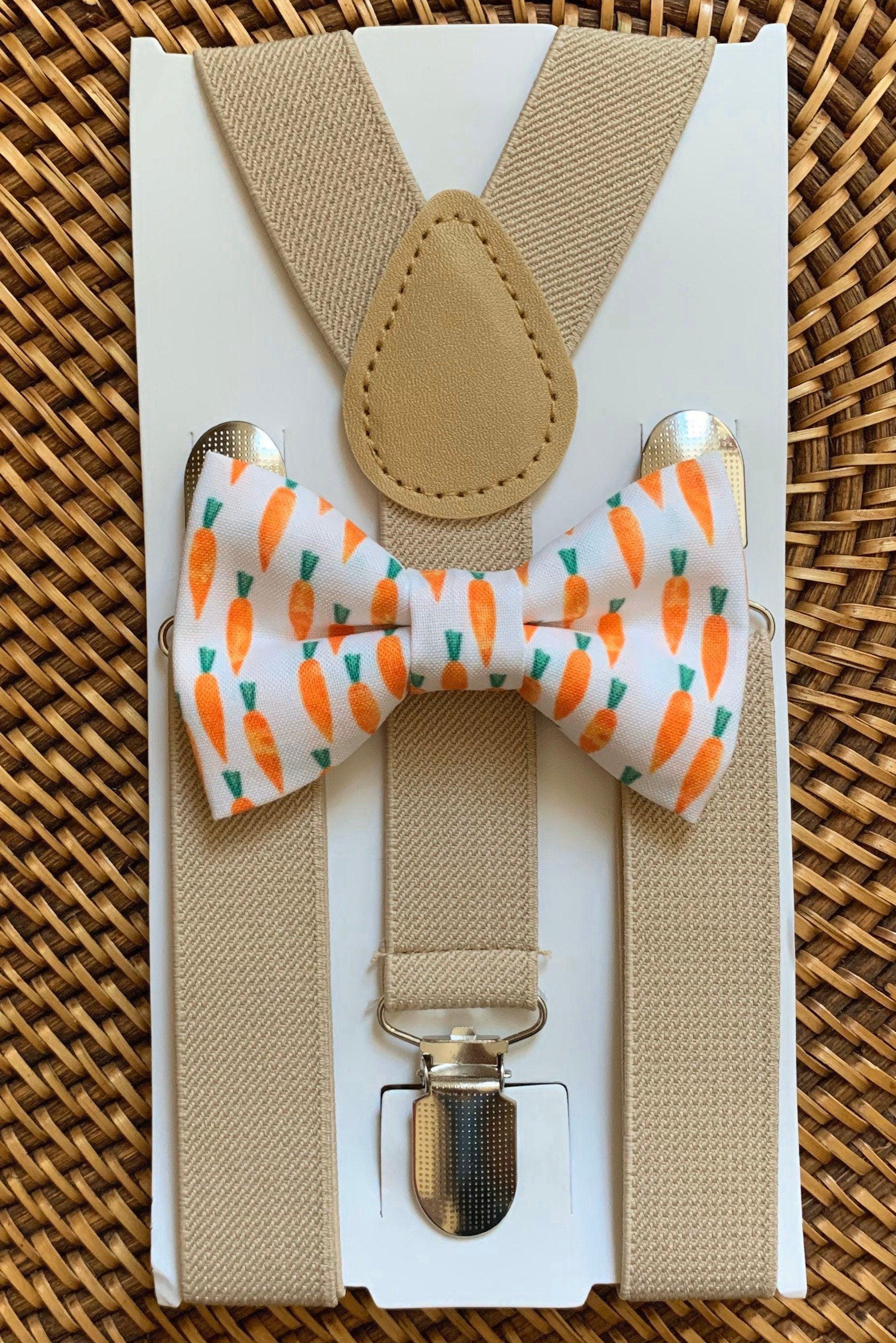 The Bold Bow Tie size chart for bow tie and suspender sets showing Small, Medium, Adult, and Big & Tall sizes with typical age ranges, suspender lengths, and bow tie widths. Small fits ages 6 months–6 years with 18–29 inch suspenders and a 3.5 inch bow tie; Medium fits ages 7–12 years with 25.5–40 inch suspenders and a 4 inch bow tie; Adult fits ages 13 years–6 feet tall with 25.5–40 inch suspenders and a 4.5 inch bow tie; Big & Tall fits over 6 feet tall with 31–53 inch suspenders and a 4.5 inch bow tie.