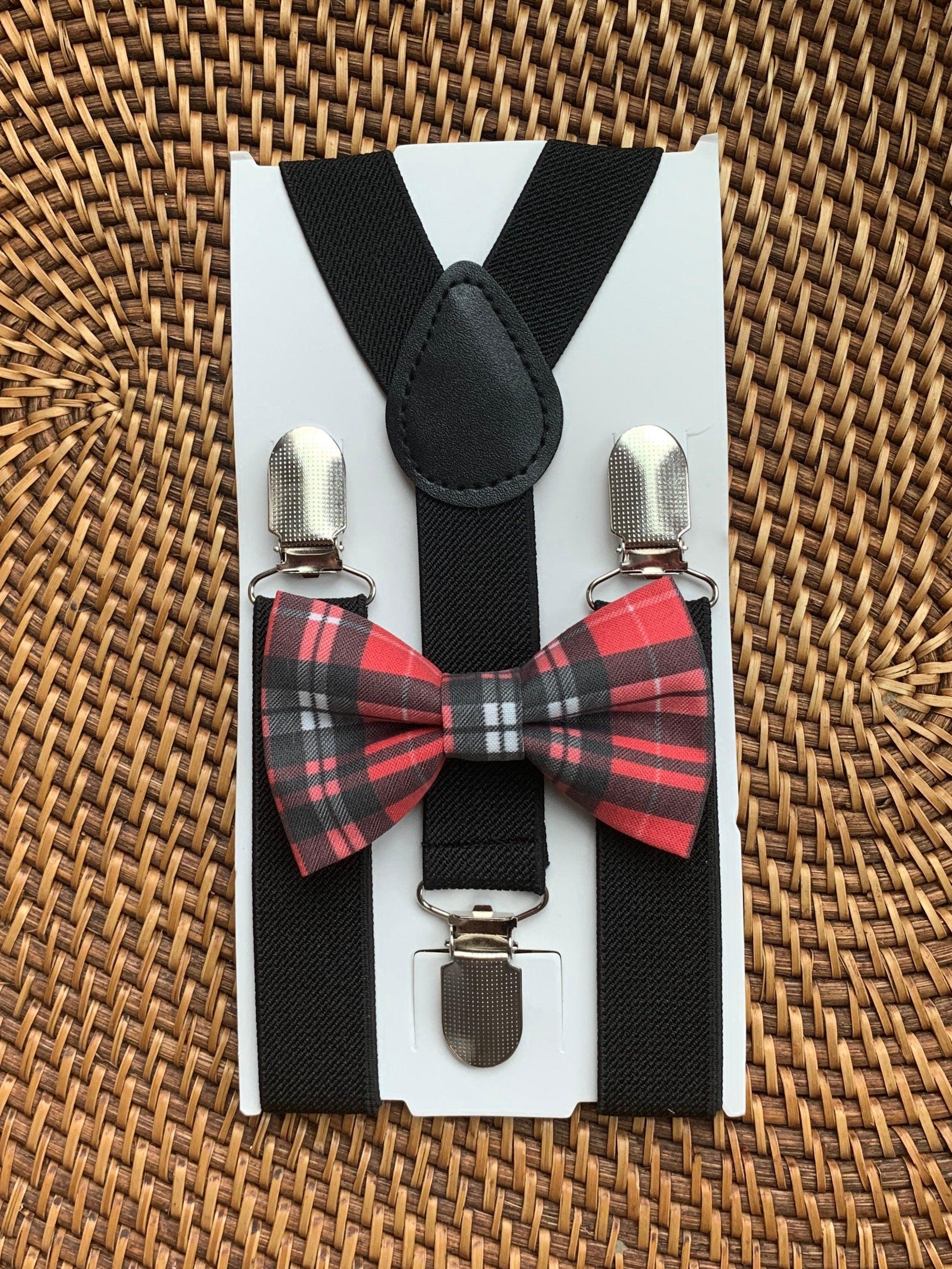 The Bold Bow Tie size chart for bow tie and suspender sets showing Small, Medium, Adult, and Big & Tall sizes with typical age ranges, suspender lengths, and bow tie widths. Small fits ages 6 months–6 years with 18–29 inch suspenders and a 3.5 inch bow tie; Medium fits ages 7–12 years with 25.5–40 inch suspenders and a 4 inch bow tie; Adult fits ages 13 years–6 feet tall with 25.5–40 inch suspenders and a 4.5 inch bow tie; Big & Tall fits over 6 feet tall with 31–53 inch suspenders and a 4.5 inch bow tie.