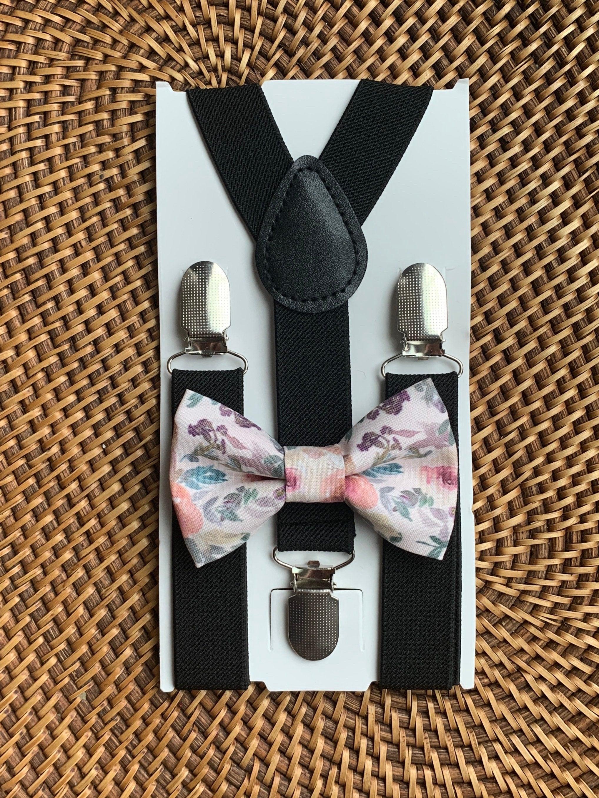 Size chart for suspender and bow tie sets from The Bold Bow Tie. Small (6mo-6yr): 18"-29" suspenders, 3.5" bow. Medium (7-12yr): 25.5"-40" suspenders, 4" bow. Adult (13yr-6ft tall): 25.5"-40" suspenders, 4.5" bow. Big & Tall (Over 6ft tall): 31"-53" suspenders, 4.5" bow. Instructions note to measure from the back waistband over the shoulder to the front waistband for a comfortable fit.