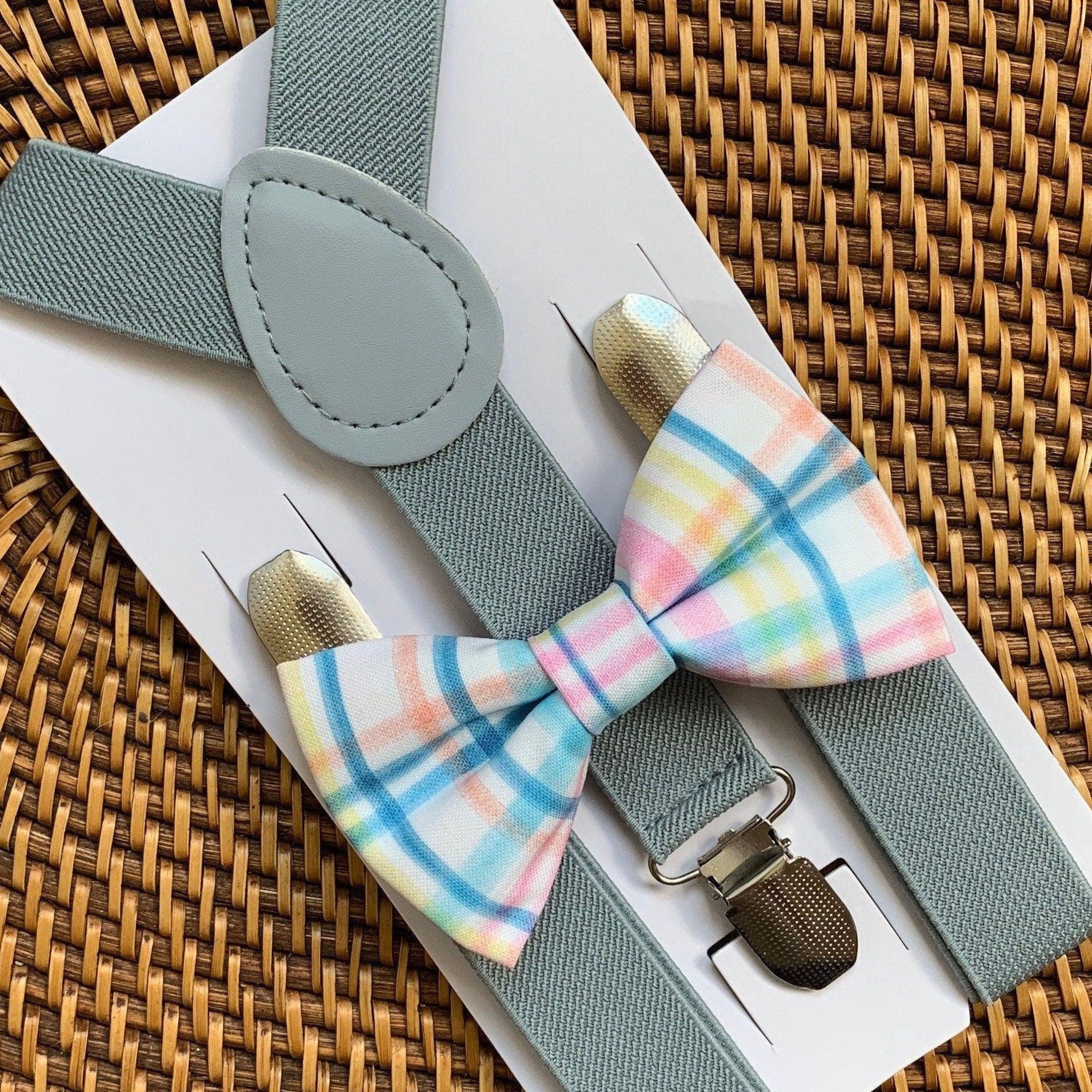 Easter bow tie in plaid pastel colors and light gray suspenders.