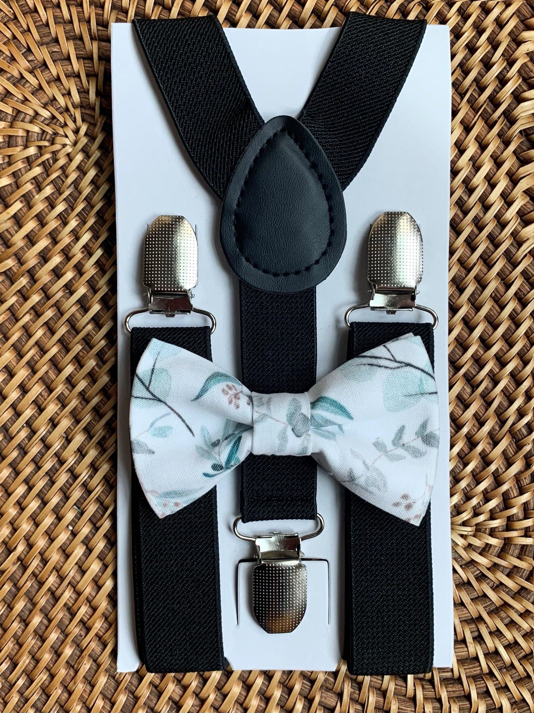 Size chart for suspender and bow tie sets from The Bold Bow Tie. Small (6mo-6yr): 18"-29" suspenders, 3.5" bow. Medium (7-12yr): 25.5"-40" suspenders, 4" bow. Adult (13yr-6ft tall): 25.5"-40" suspenders, 4.5" bow. Big & Tall (Over 6ft tall): 31"-53" suspenders, 4.5" bow. Instructions note to measure from the back waistband over the shoulder to the front waistband for a comfortable fit.