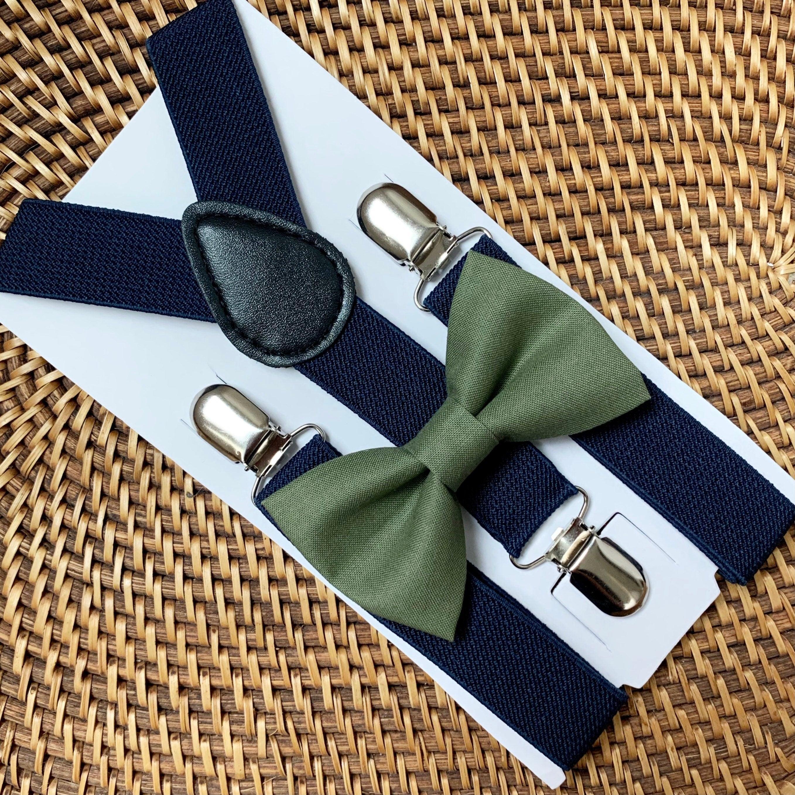 Size chart for suspender and bow tie sets from The Bold Bow Tie. Small (6mo-6yr): 18"-29" suspenders, 3.5" bow. Medium (7-12yr): 25.5"-40" suspenders, 4" bow. Adult (13yr-6ft tall): 25.5"-40" suspenders, 4.5" bow. Big & Tall (Over 6ft tall): 31"-53" suspenders, 4.5" bow. Instructions note to measure from the back waistband over the shoulder to the front waistband for a comfortable fit.