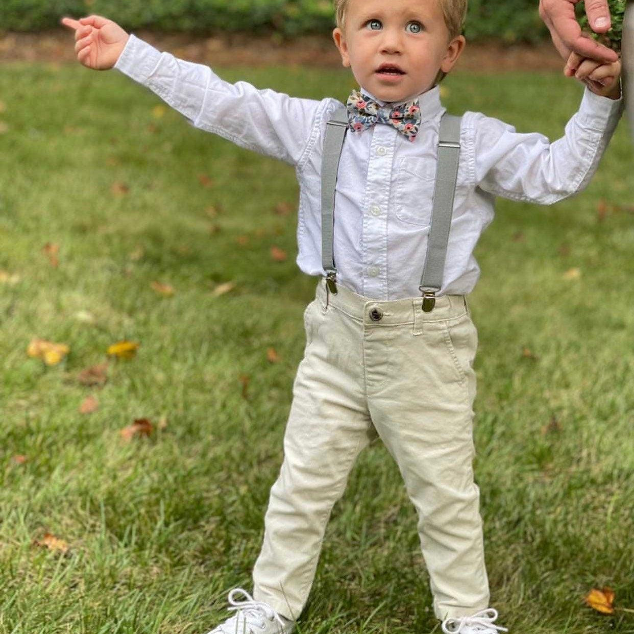 Ring bearer in floral bow tie