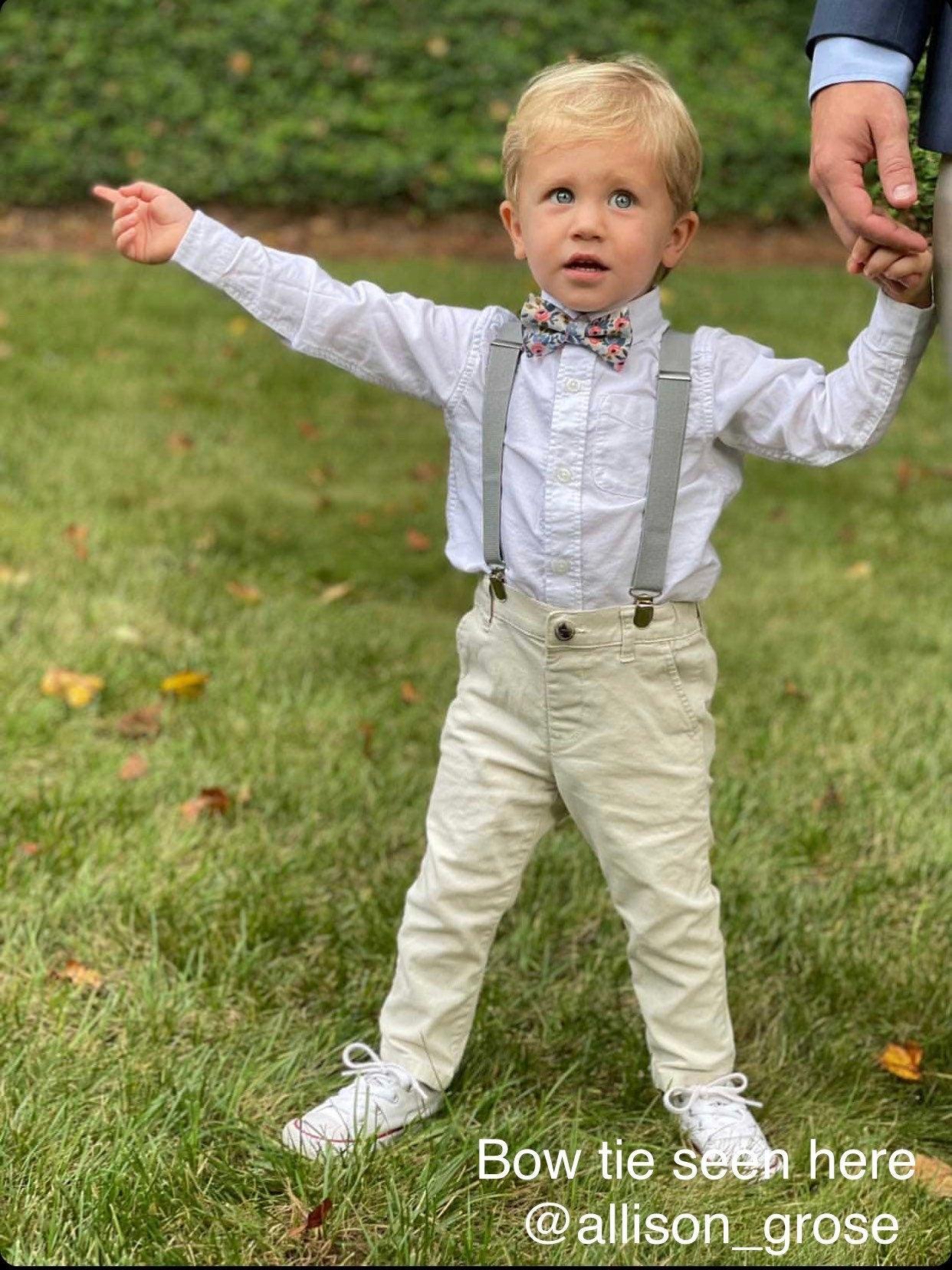 Ring bearer in floral bow tie