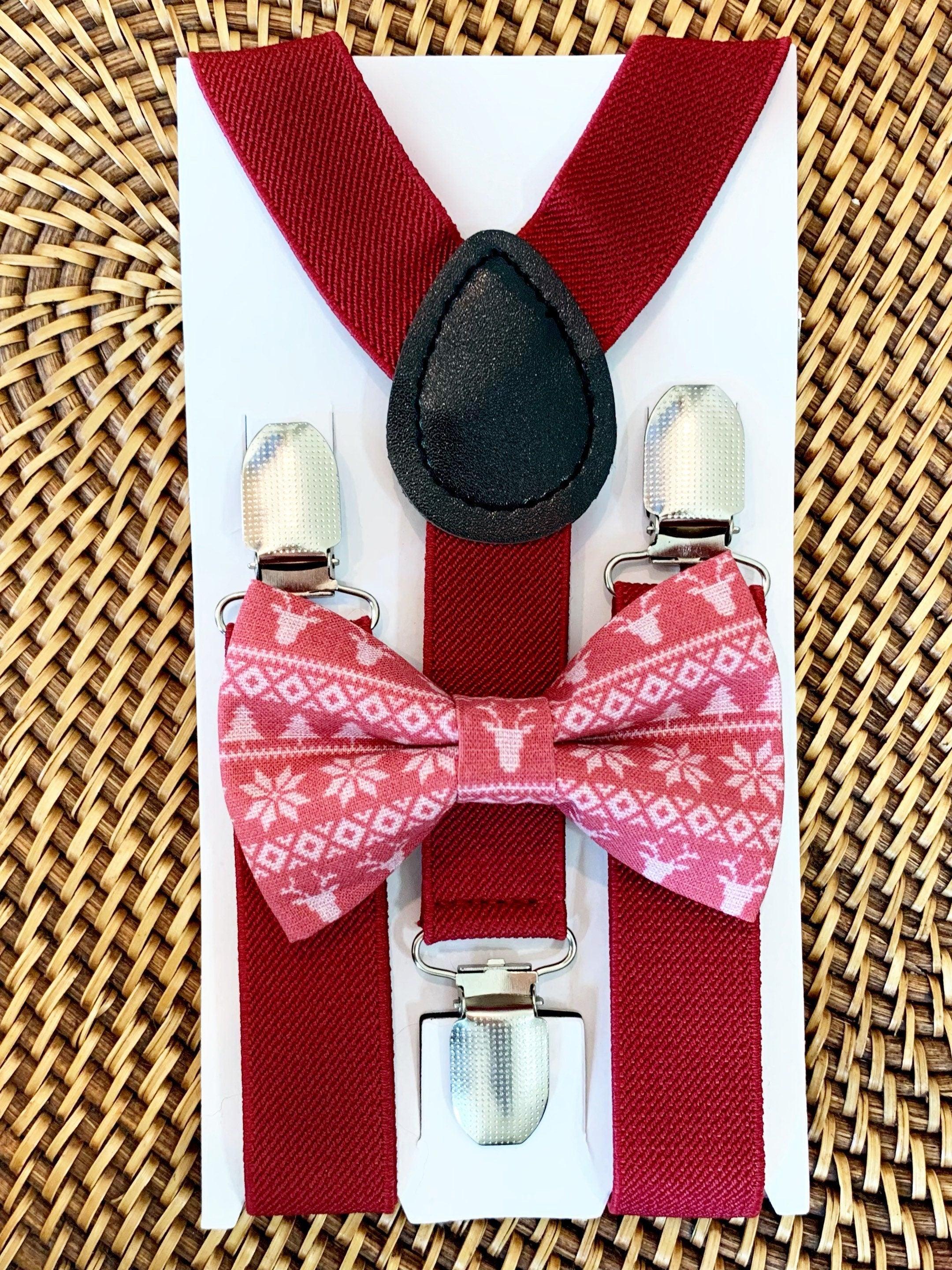 The Bold Bow Tie size chart for bow tie and suspender sets showing Small, Medium, Adult, and Big & Tall sizes with typical age ranges, suspender lengths, and bow tie widths. Small fits ages 6 months–6 years with 18–29 inch suspenders and a 3.5 inch bow tie; Medium fits ages 7–12 years with 25.5–40 inch suspenders and a 4 inch bow tie; Adult fits ages 13 years–6 feet tall with 25.5–40 inch suspenders and a 4.5 inch bow tie; Big & Tall fits over 6 feet tall with 31–53 inch suspenders and a 4.5 inch bow tie.