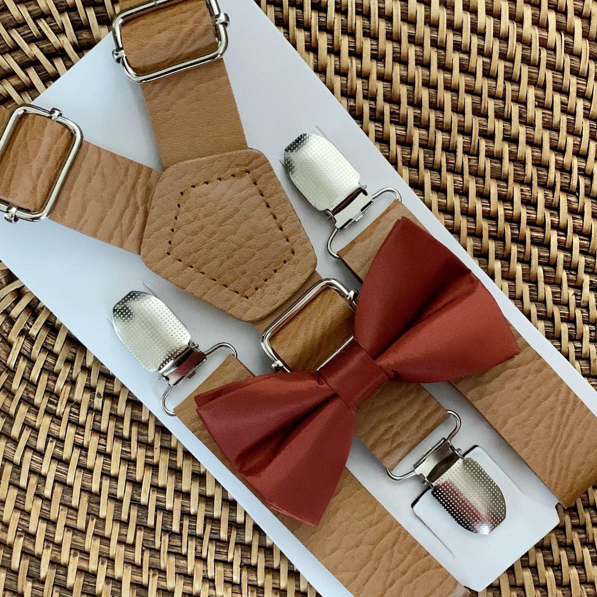 Cinnamon bow tie and brown vegan leather suspenders.