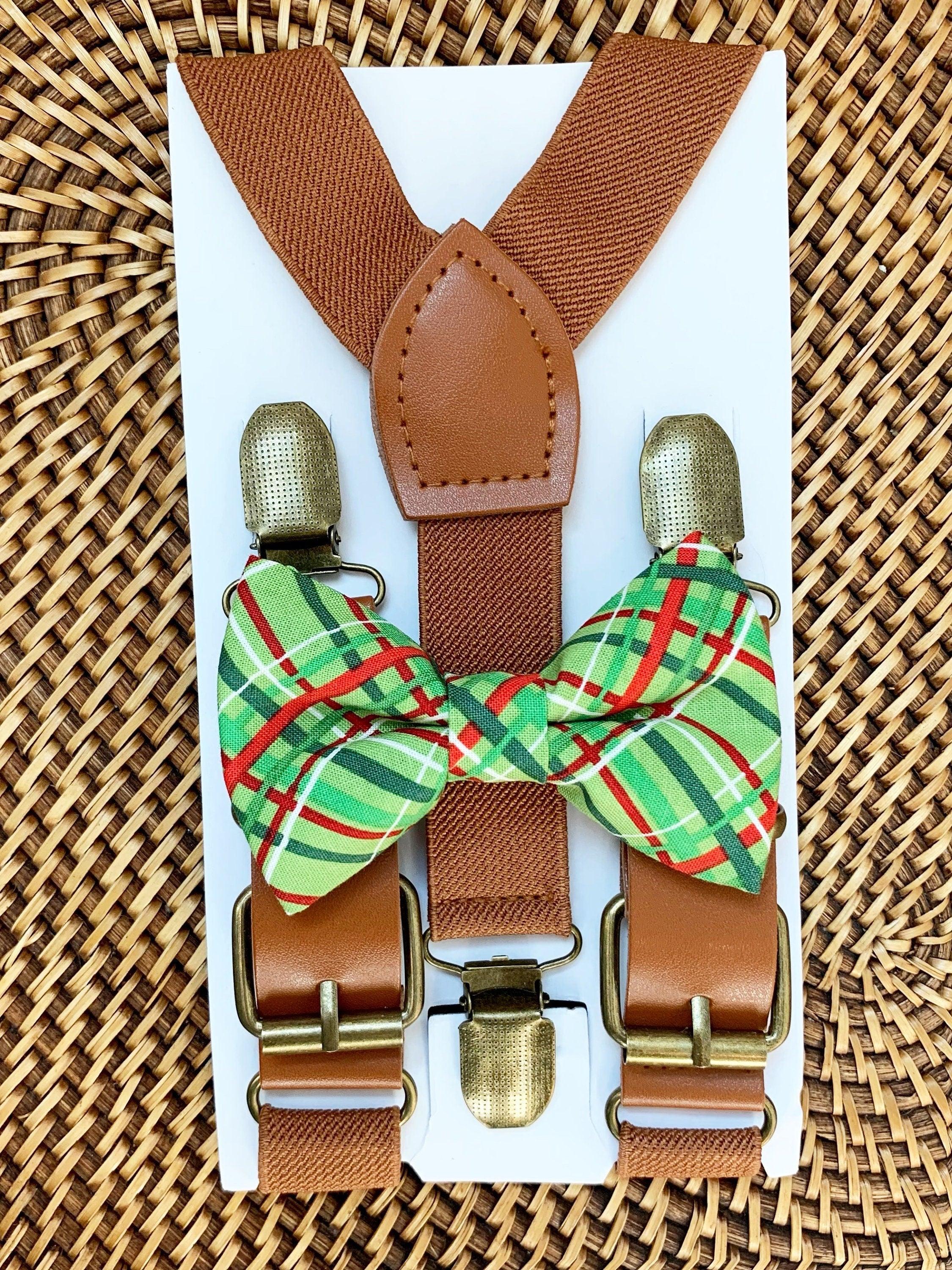 Size chart for suspender and bow tie sets from The Bold Bow Tie. X-Small (6mo-4yr): 15"-23" suspenders, 3.5" bow. Small (5-9yr): 18"-33" suspenders, 3.5" bow. Medium (10-12yr): 18"-33" suspenders, 4" bow. Adult (13yr-6'5"): 30"-53" suspenders, 4.5" bow. Big & Tall (Over 6'5"): 53"+ suspenders, 4.5" bow. Instructions note to measure from the back waistband over the shoulder to the front waistband for a comfortable fit.