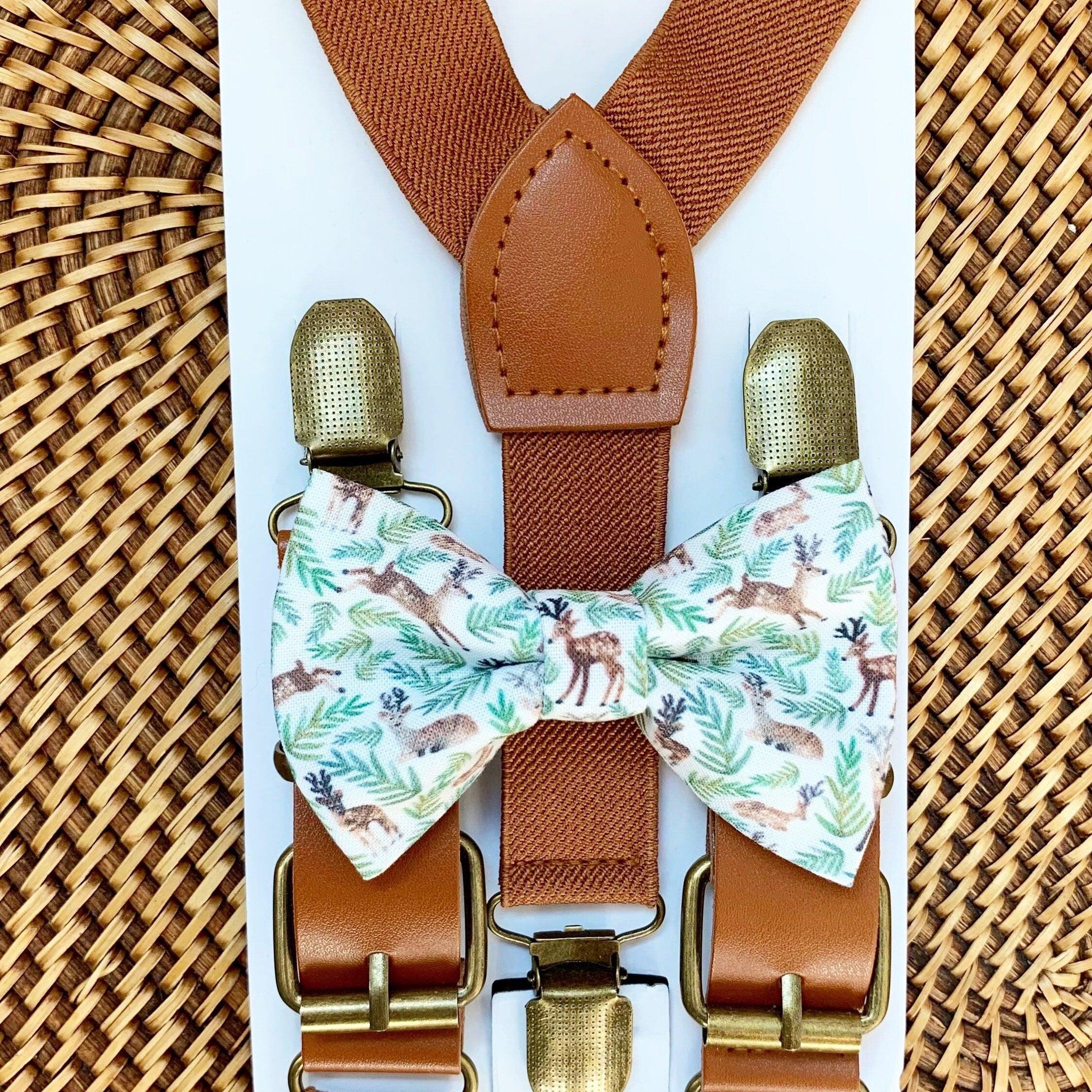 Size chart for suspender and bow tie sets from The Bold Bow Tie. X-Small (6mo-4yr): 15"-23" suspenders, 3.5" bow. Small (5-9yr): 18"-33" suspenders, 3.5" bow. Medium (10-12yr): 18"-33" suspenders, 4" bow. Adult (13yr-6'5"): 30"-53" suspenders, 4.5" bow. Big & Tall (Over 6'5"): 53"+ suspenders, 4.5" bow. Instructions note to measure from the back waistband over the shoulder to the front waistband for a comfortable fit.