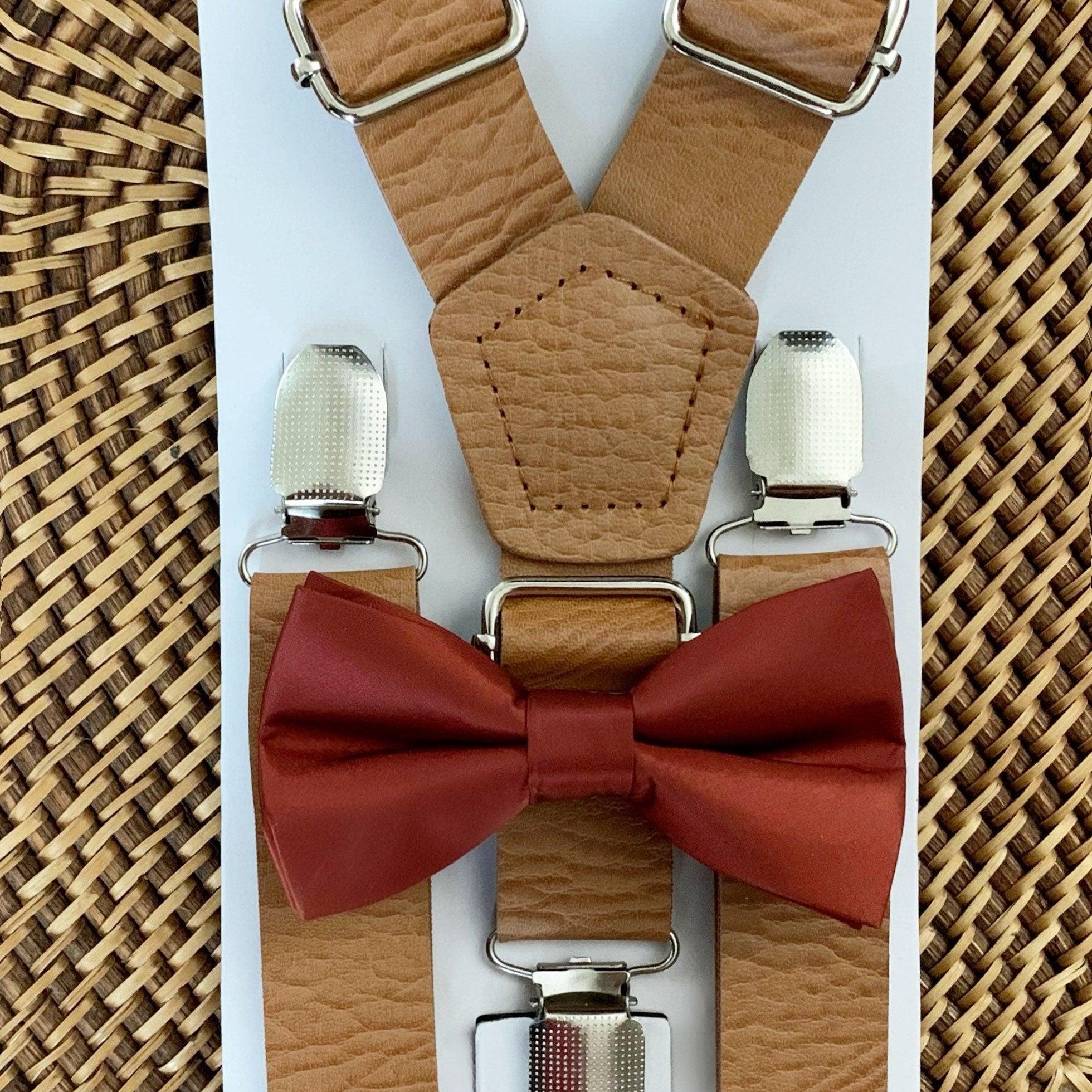 Cinnamon bow tie and brown vegan leather suspenders.