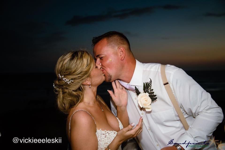 Tan men’s suspenders for wedding worn by groom
