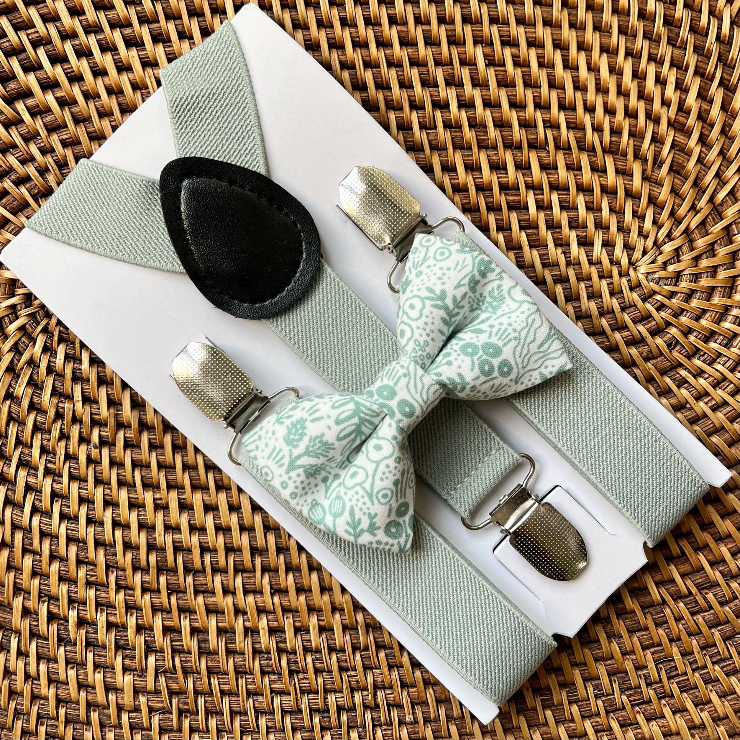 Size chart for suspender and bow tie sets from The Bold Bow Tie. Small (6mo-6yr): 18"-29" suspenders, 3.5" bow. Medium (7-12yr): 25.5"-40" suspenders, 4" bow. Adult (13yr-6ft tall): 25.5"-40" suspenders, 4.5" bow. Big & Tall (Over 6ft tall): 31"-53" suspenders, 4.5" bow. Instructions note to measure from the back waistband over the shoulder to the front waistband for a comfortable fit.
