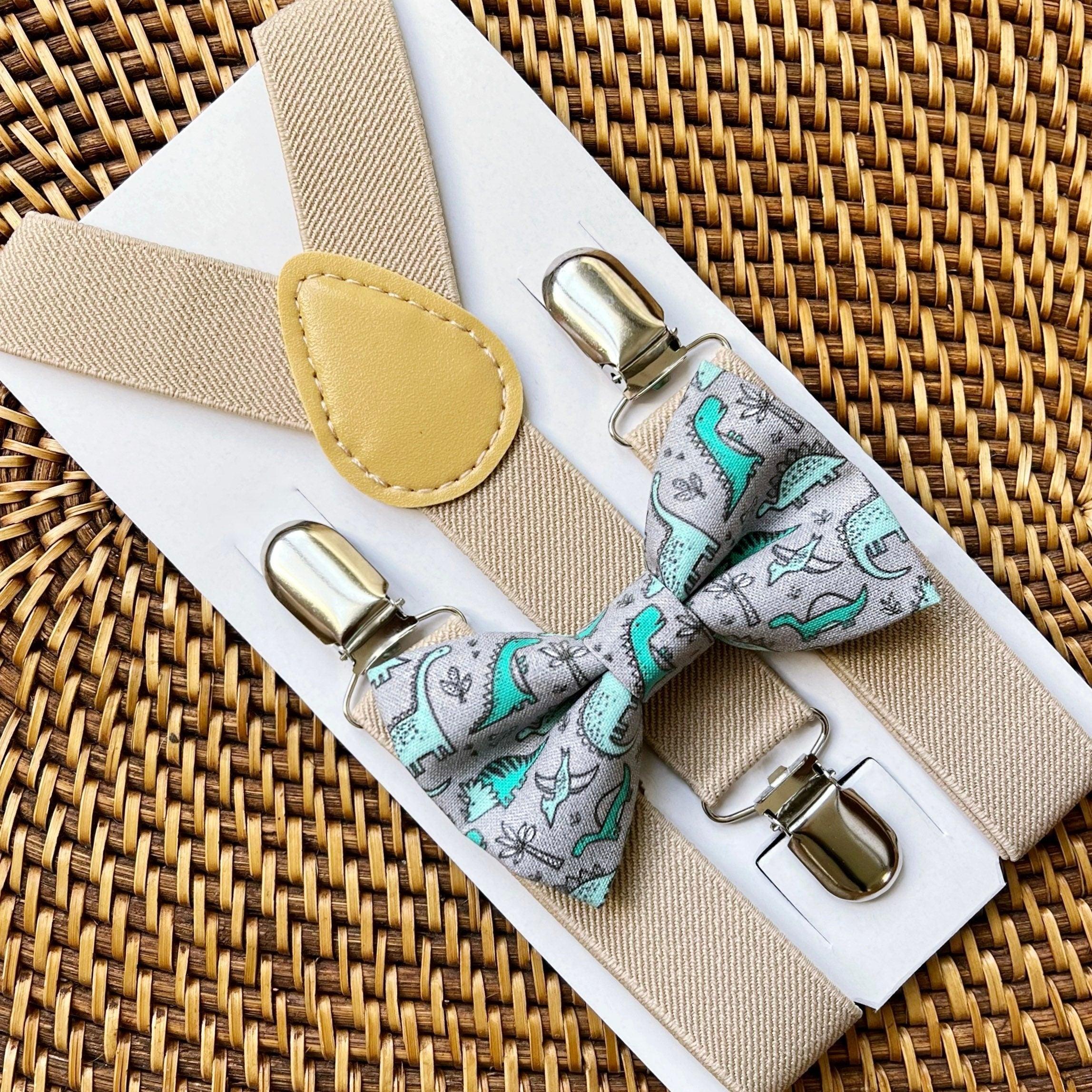 The Bold Bow Tie size chart for bow tie and suspender sets showing Small, Medium, Adult, and Big & Tall sizes with typical age ranges, suspender lengths, and bow tie widths. Small fits ages 6 months–6 years with 18–29 inch suspenders and a 3.5 inch bow tie; Medium fits ages 7–12 years with 25.5–40 inch suspenders and a 4 inch bow tie; Adult fits ages 13 years–6 feet tall with 25.5–40 inch suspenders and a 4.5 inch bow tie; Big & Tall fits over 6 feet tall with 31–53 inch suspenders and a 4.5 inch bow tie.