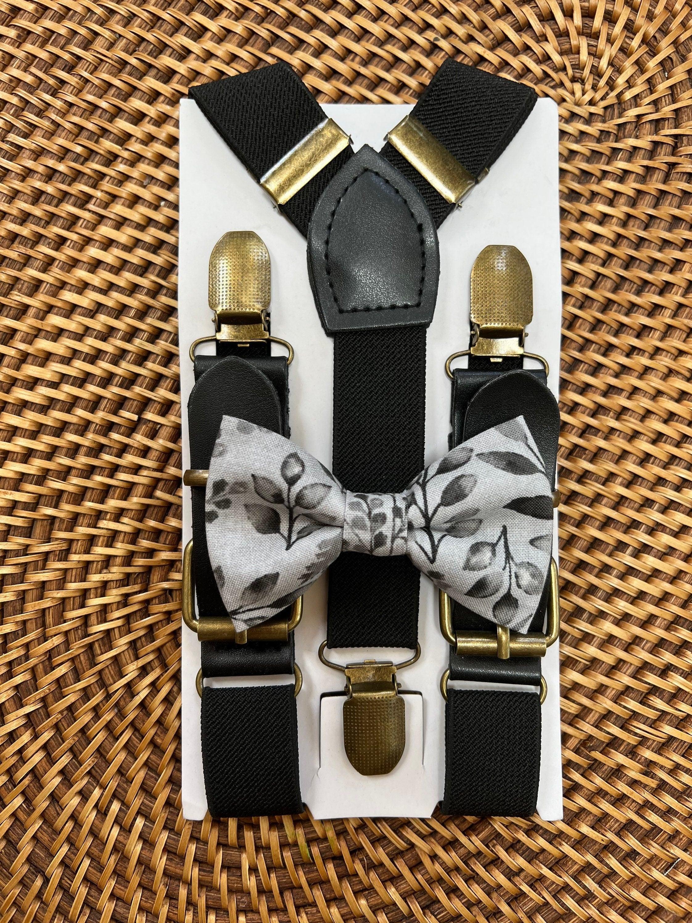 Size chart for suspender and bow tie sets from The Bold Bow Tie. X-Small (6mo-4yr): 15"-23" suspenders, 3.5" bow. Small (5-9yr): 18"-33" suspenders, 3.5" bow. Medium (10-12yr): 18"-33" suspenders, 4" bow. Adult (13yr-6'5"): 30"-53" suspenders, 4.5" bow. Big & Tall (Over 6'5"): 53"+ suspenders, 4.5" bow. Instructions note to measure from the back waistband over the shoulder to the front waistband for a comfortable fit.
