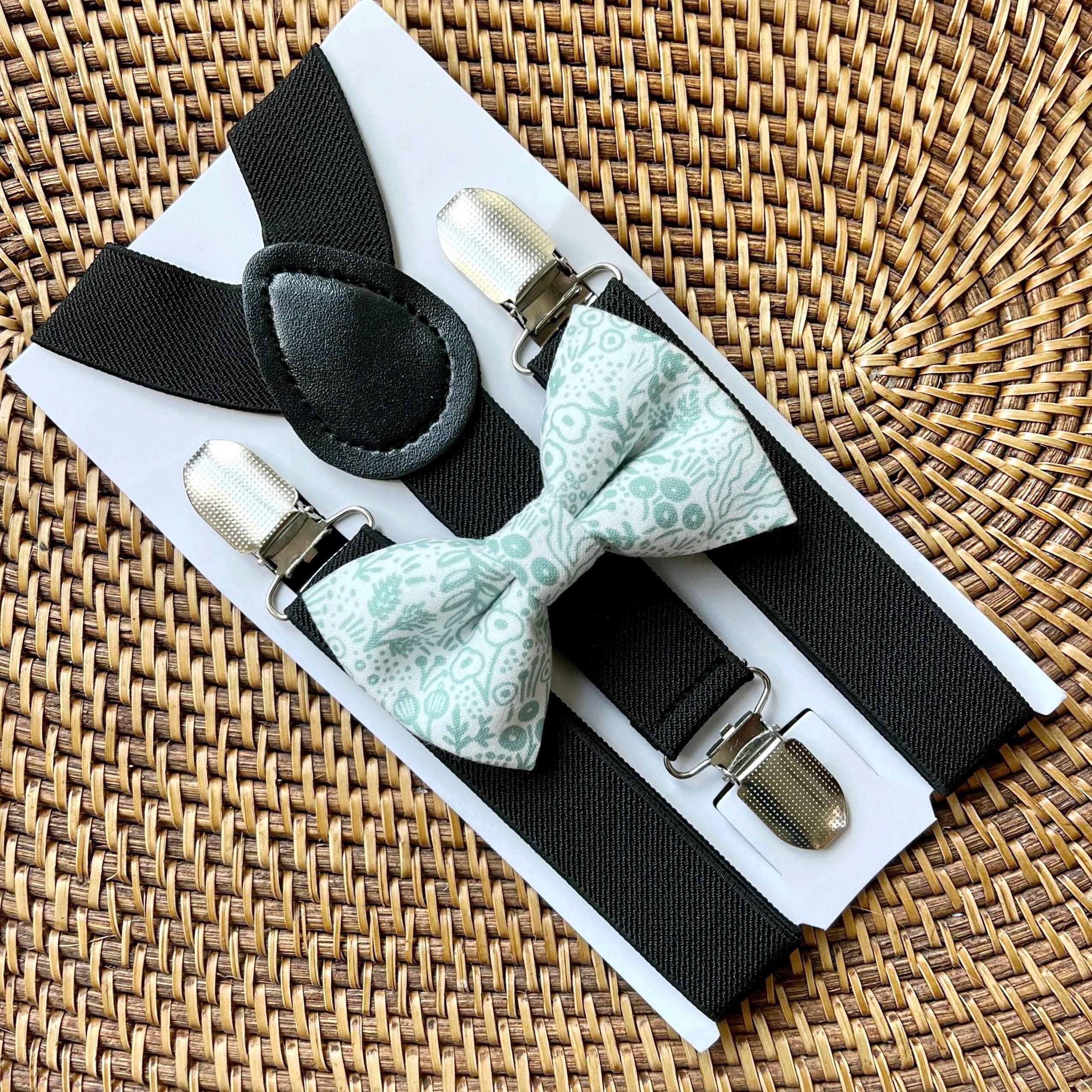 Size chart for suspender and bow tie sets from The Bold Bow Tie. Small (6mo-6yr): 18"-29" suspenders, 3.5" bow. Medium (7-12yr): 25.5"-40" suspenders, 4" bow. Adult (13yr-6ft tall): 25.5"-40" suspenders, 4.5" bow. Big & Tall (Over 6ft tall): 31"-53" suspenders, 4.5" bow. Instructions note to measure from the back waistband over the shoulder to the front waistband for a comfortable fit.