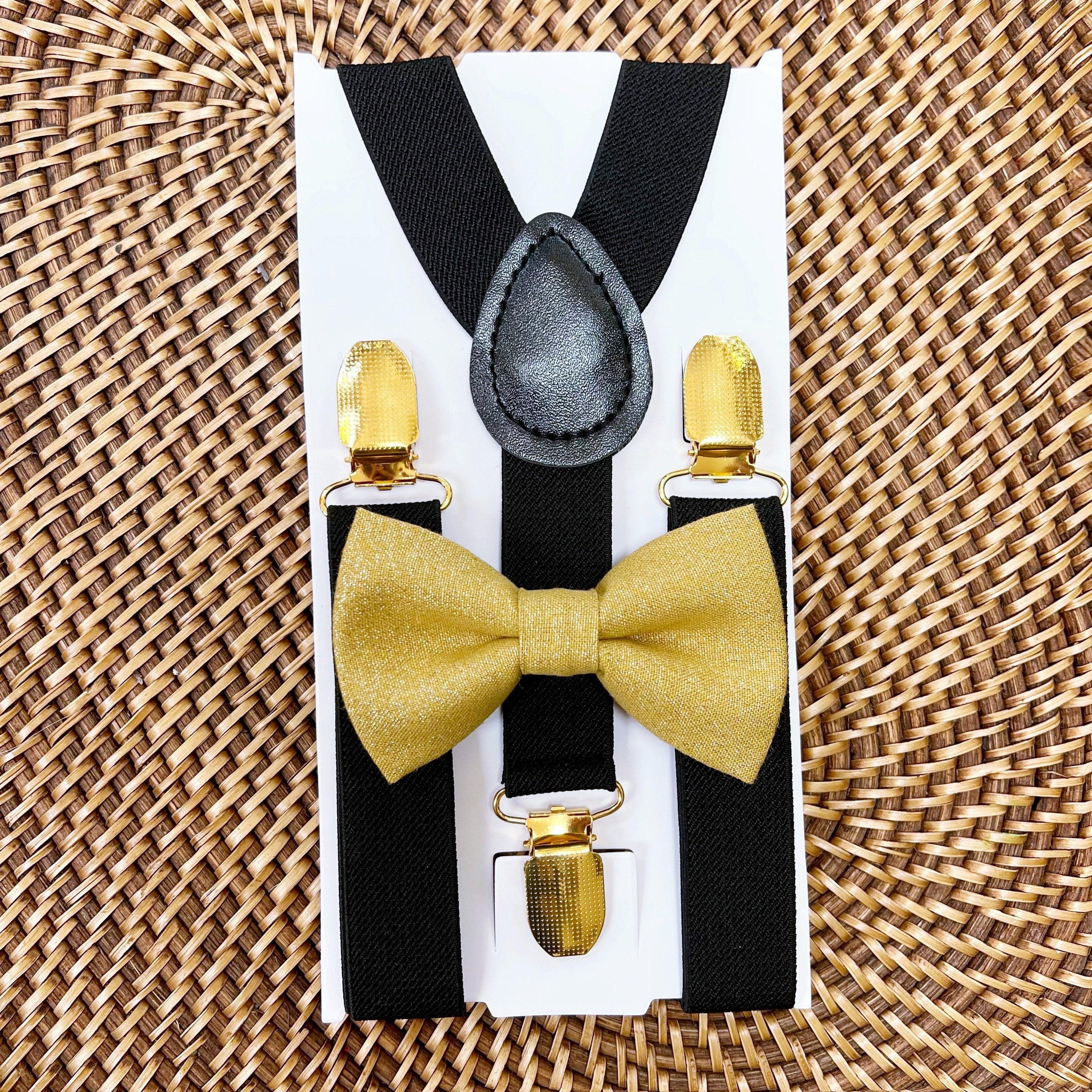 Gold bow tie and suspenders